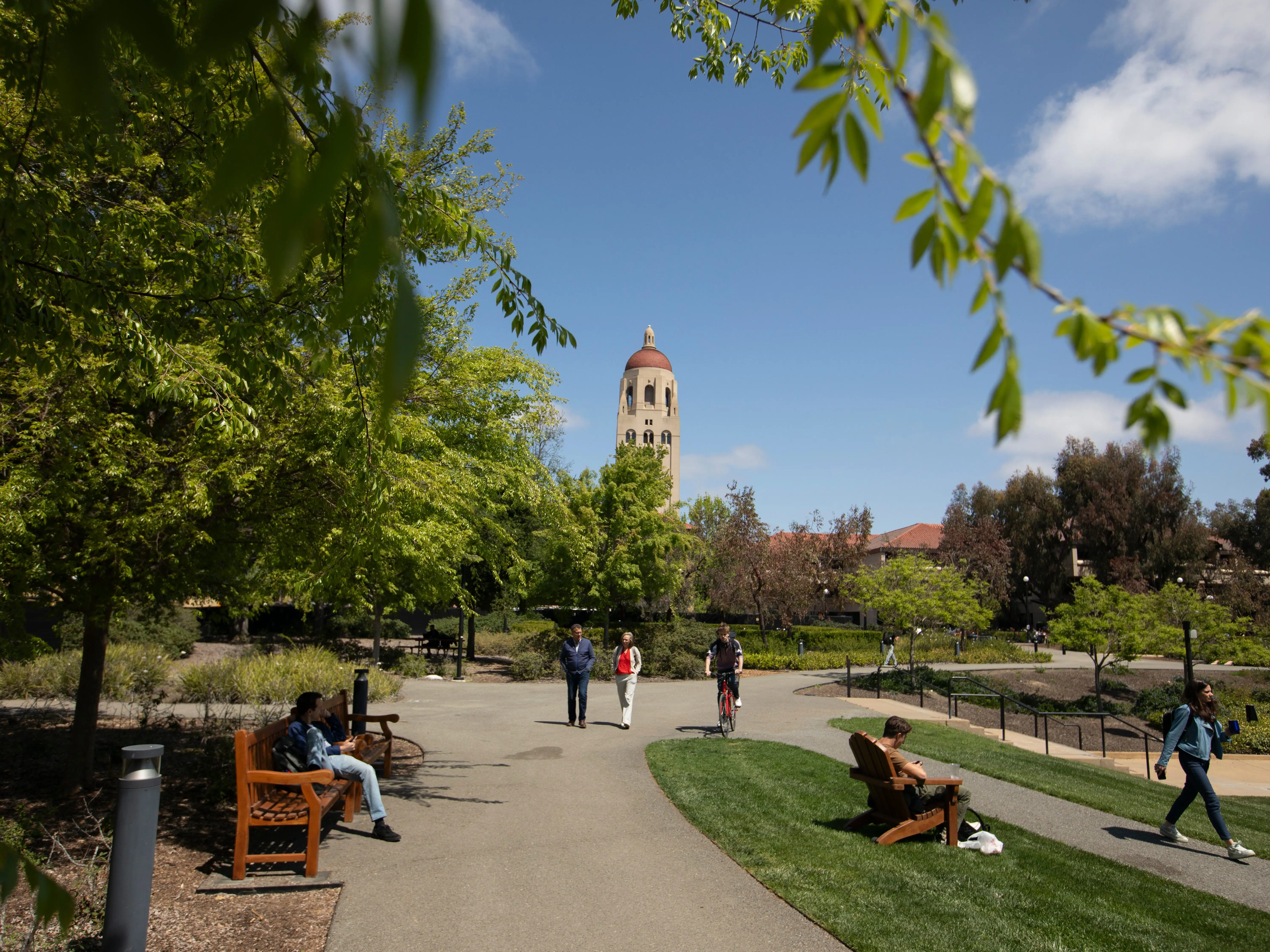 People walk on the campus of Stanford University.