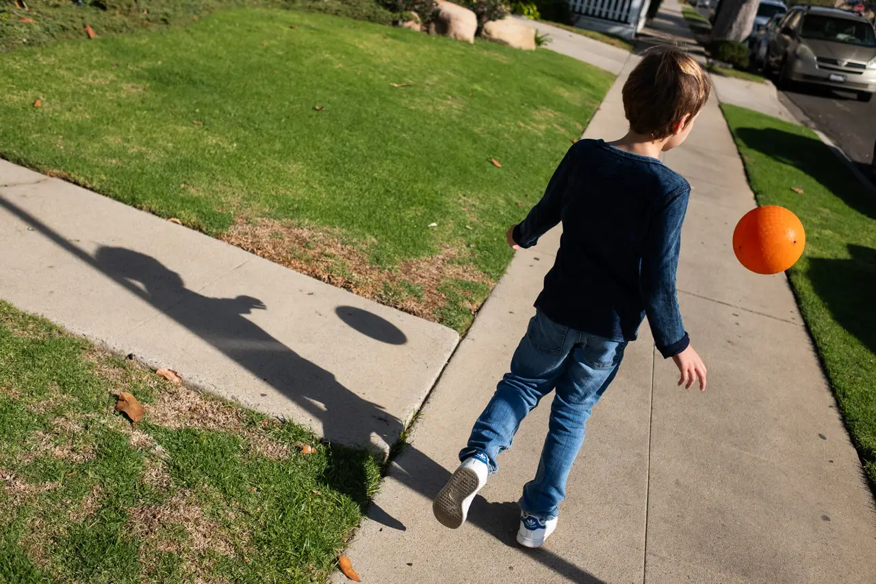 Boy playing with ball