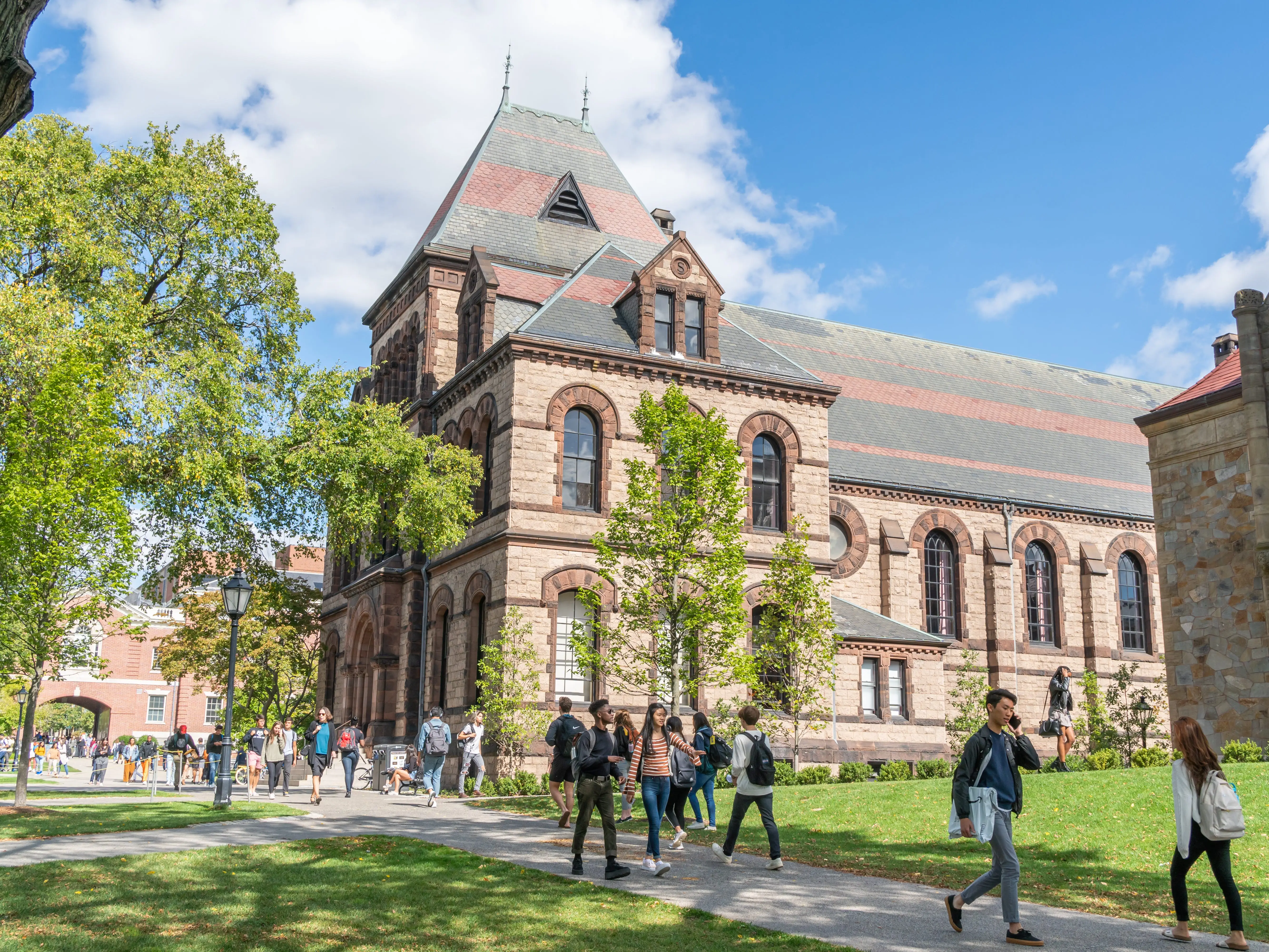 PROVIDENCE, RI/USA - SEPTEMBER 30, 2019:   Unidentfied individuals, and Sayles Hall  on the campus of Brown University.