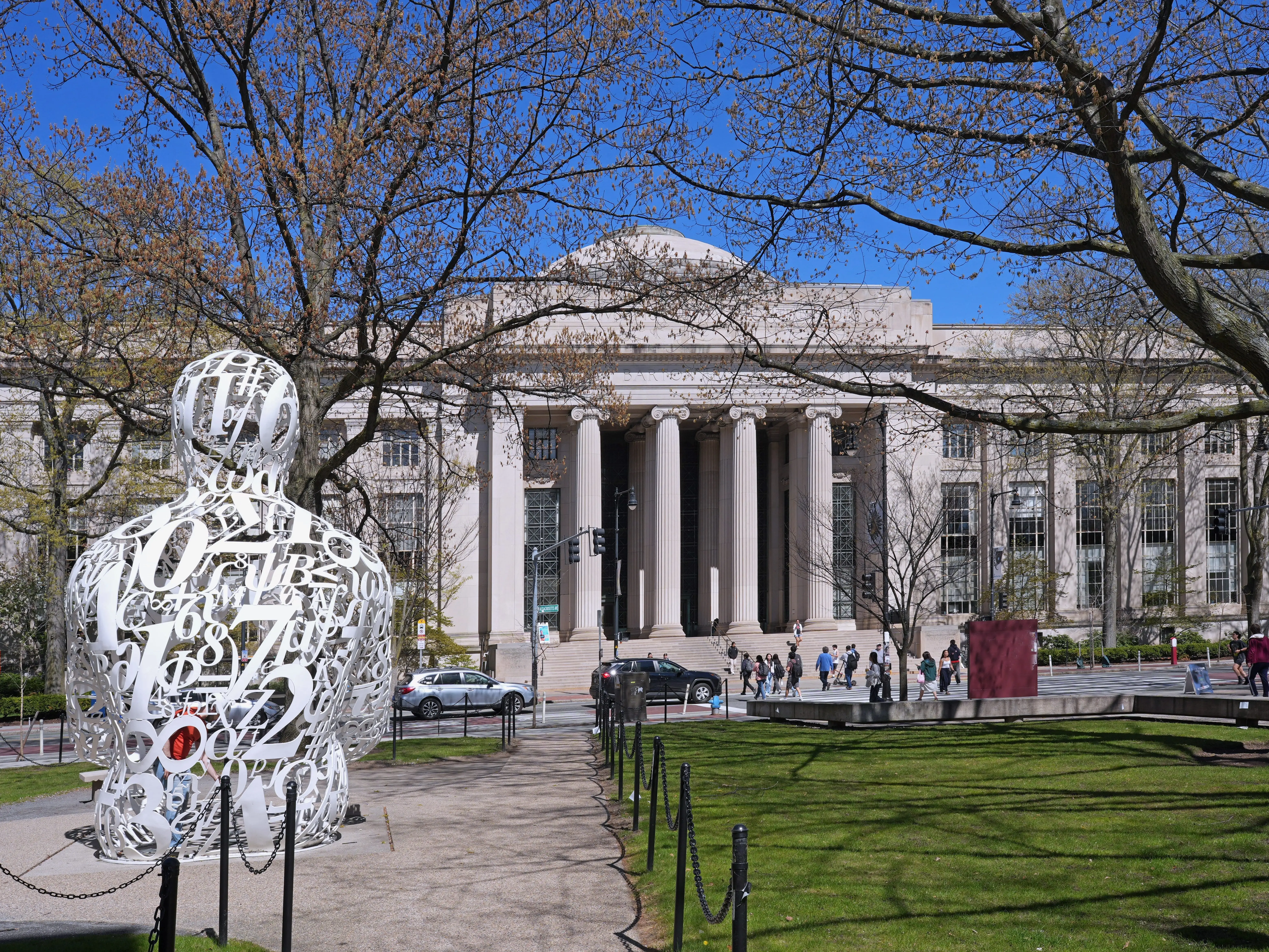 Cambridge, MA - April 27, 2026:  Massachusetts Institute of Technology campus center, Rogers Building, with mathematical sculpture by Jaume Plensa