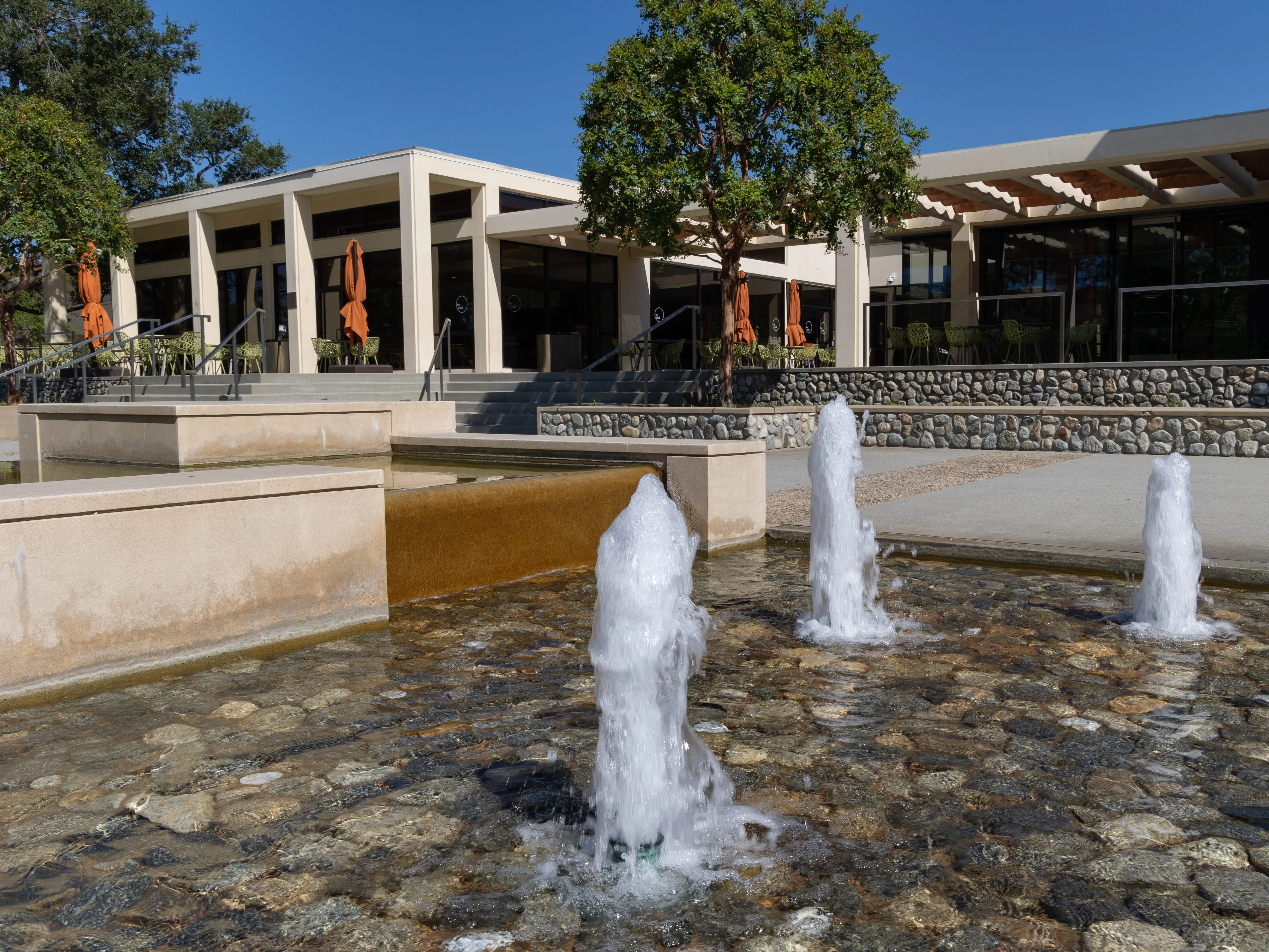 Claremont, CA - August 13 2022: Fountain in front of an academic building at Claremont McKenna College