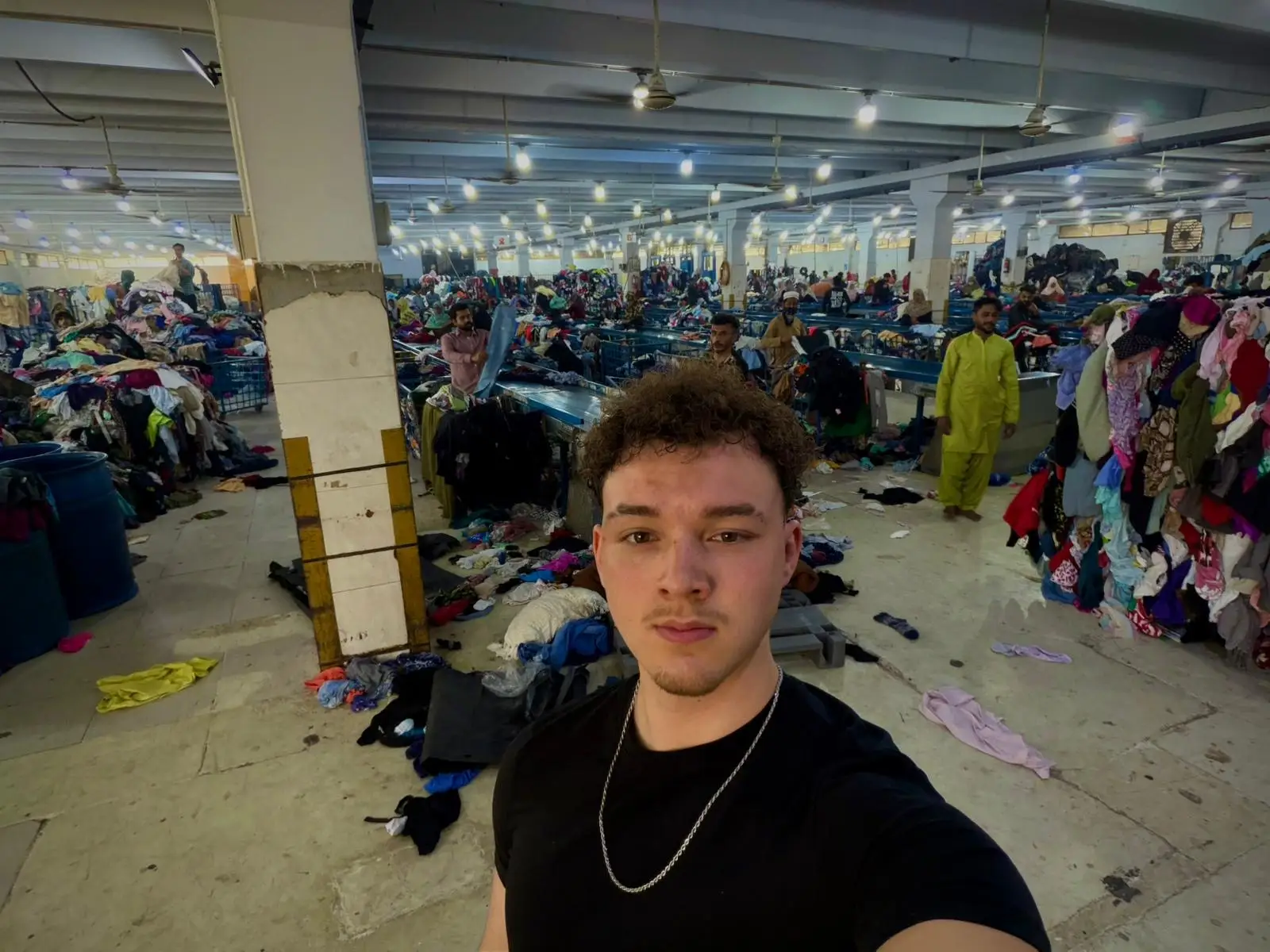 Morgan Purnell poses in front of a room in an exports zone in Karachi, Pakistan.