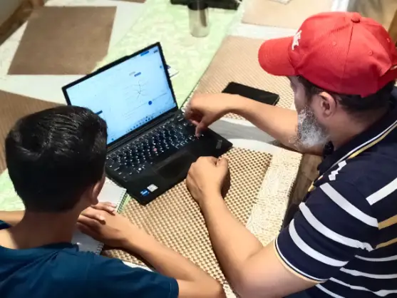 The author's husband works with one of their sons on a project. ,