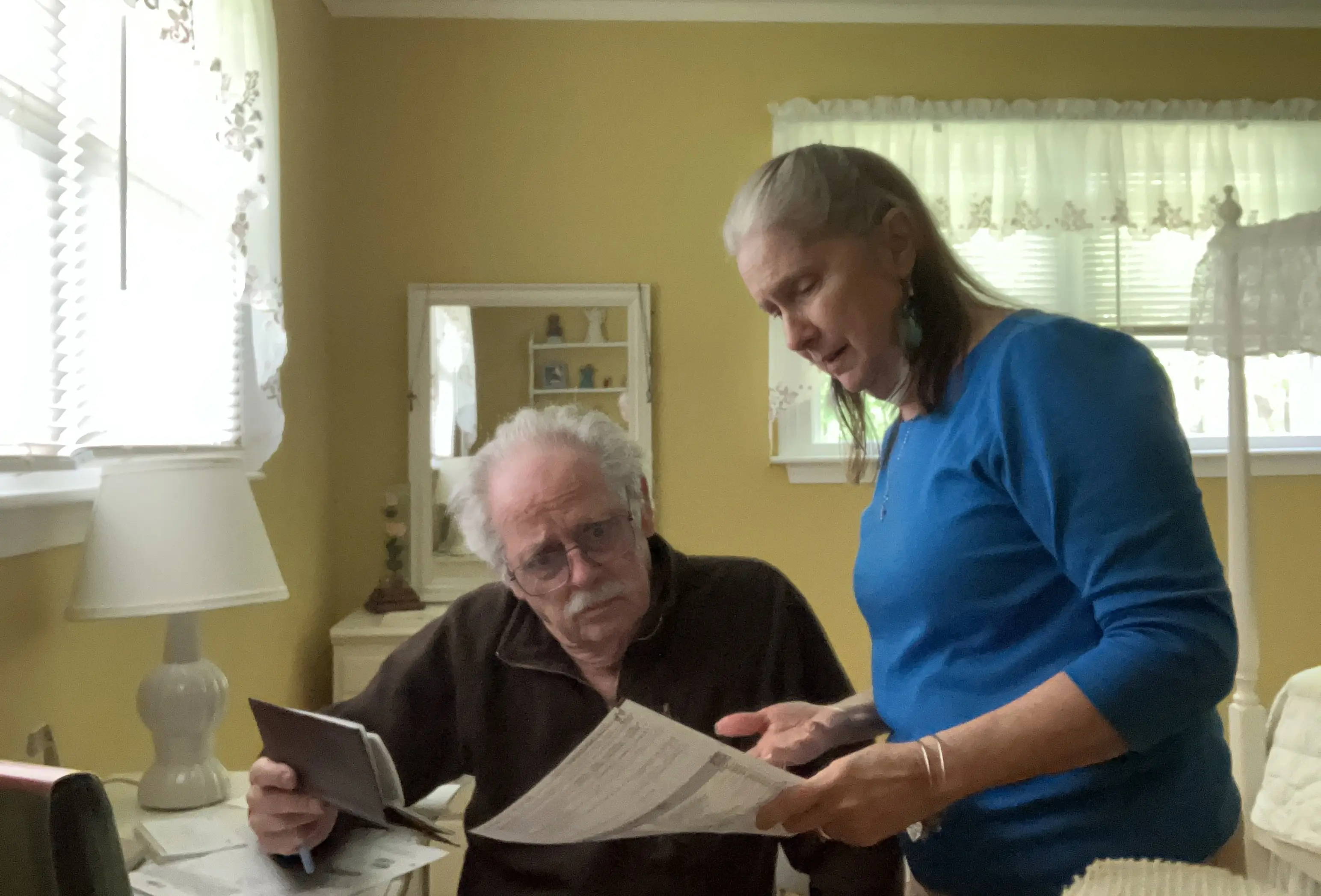 Couple looking at bills
