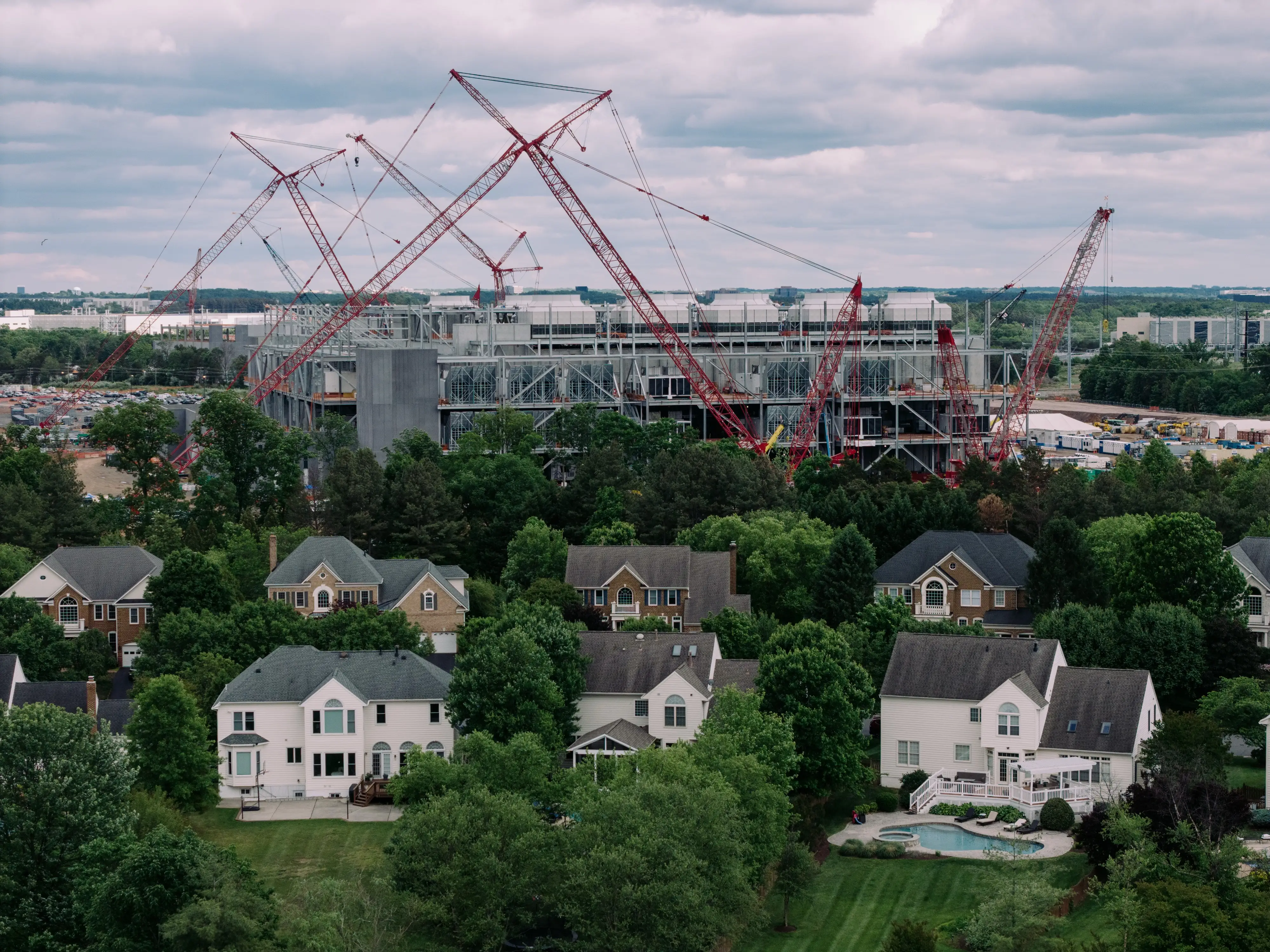 Data centers under construction are seen from The Regency, a community in Ashburn, Virginia.