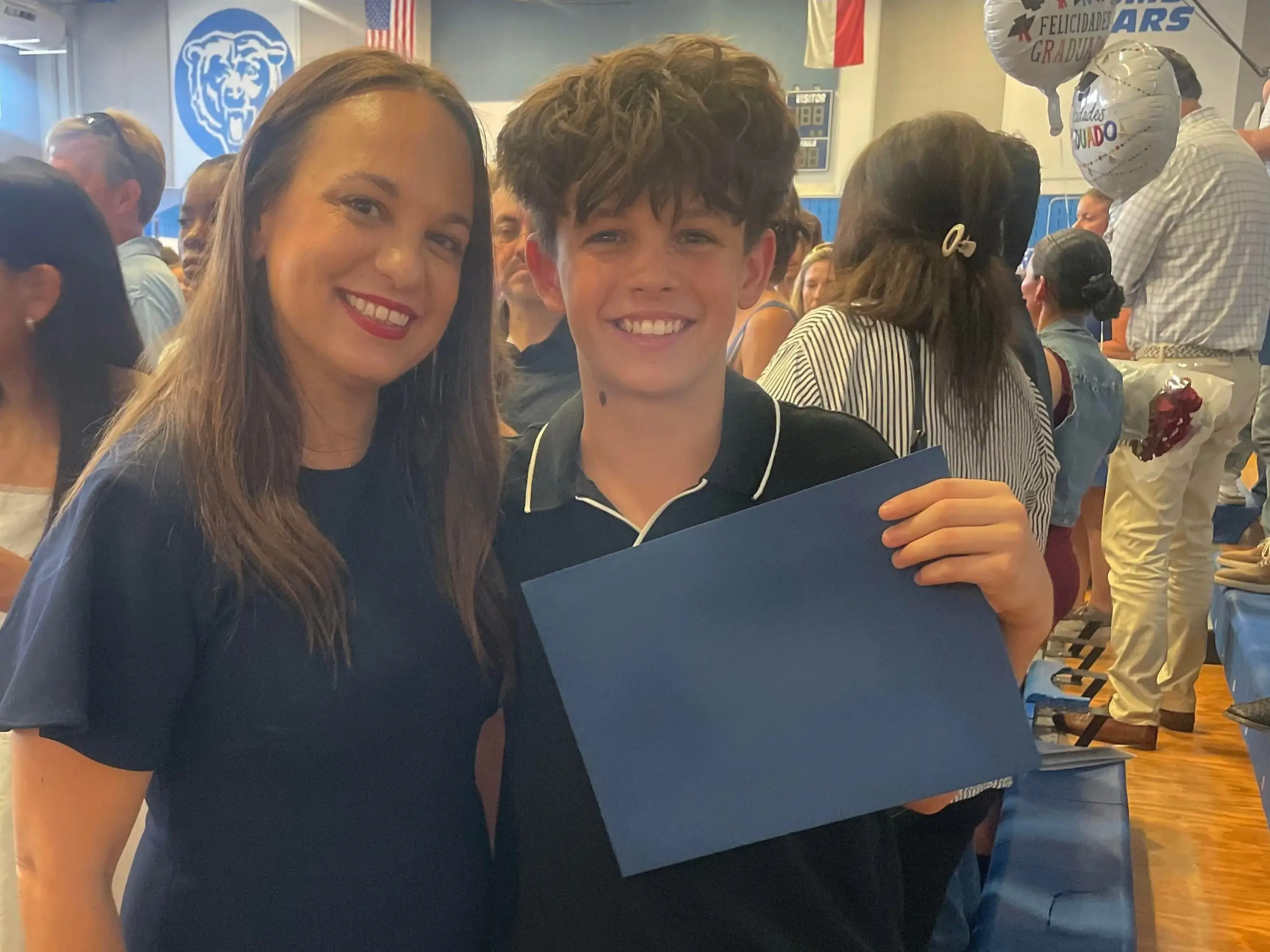 The authjor with her son at his 8th grad graduation.