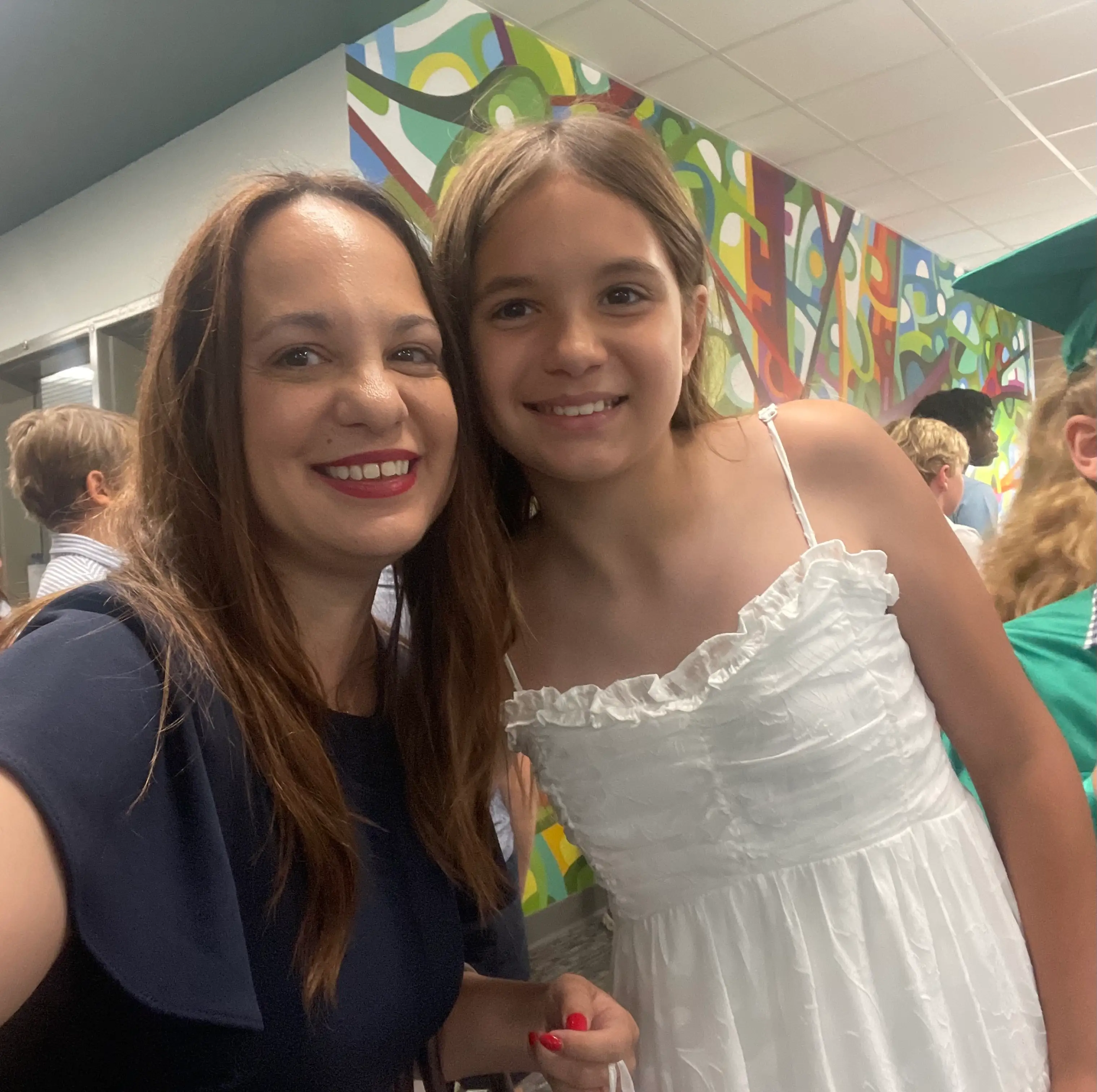 The author and her daughter at her 5th grade grauation.