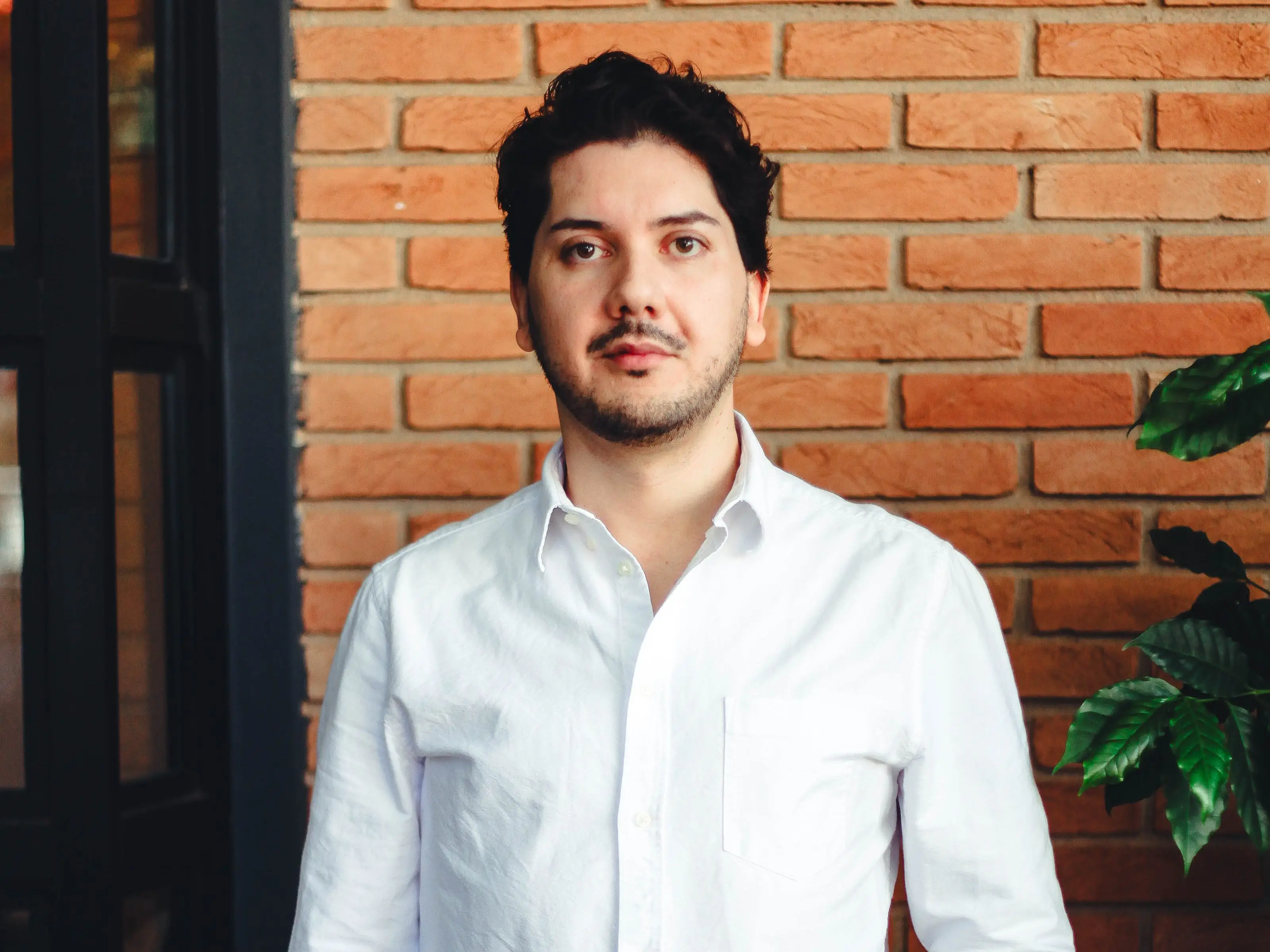 Rafa Maximo wearing a white shirt
