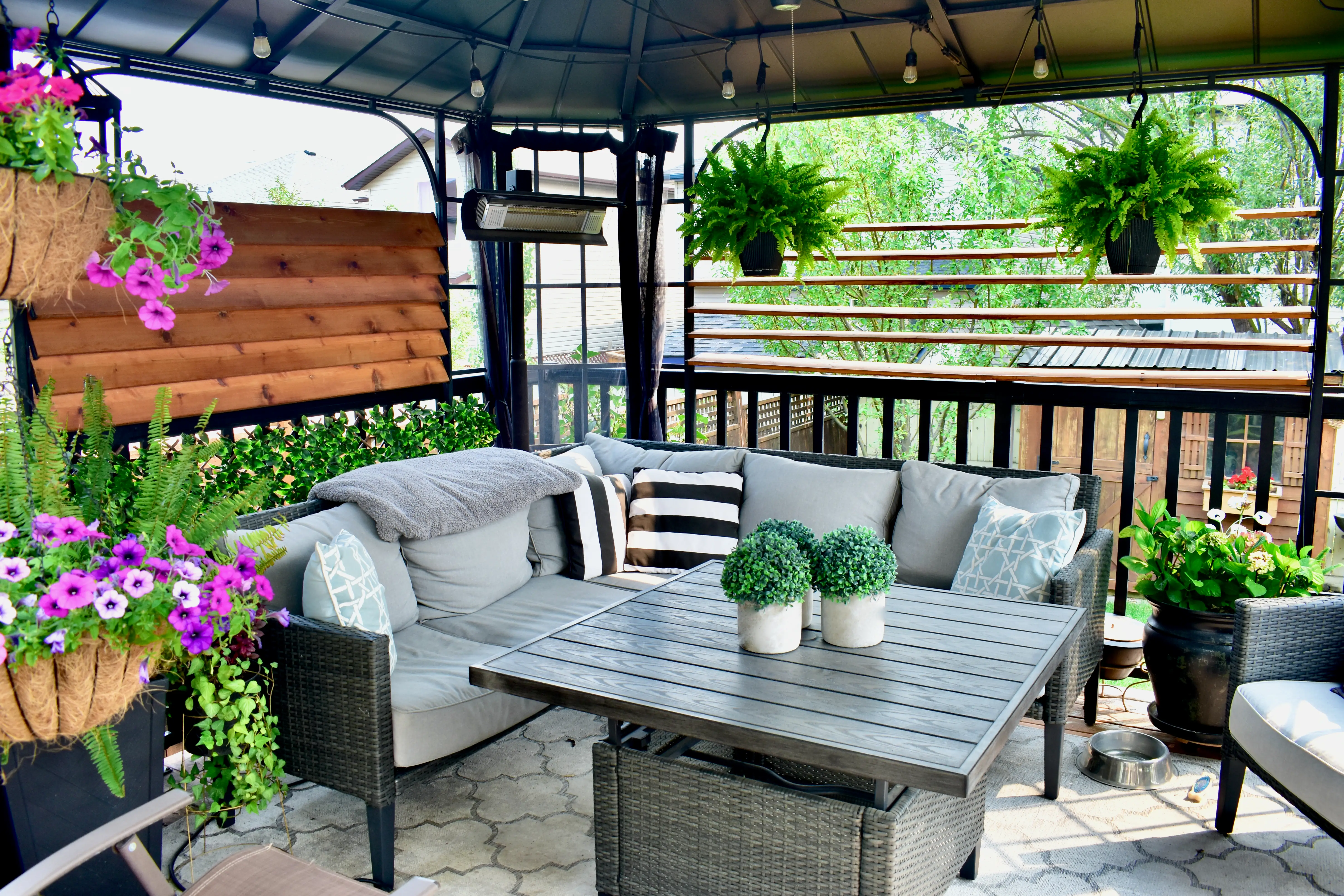 Sectional couch outdoors under pergola