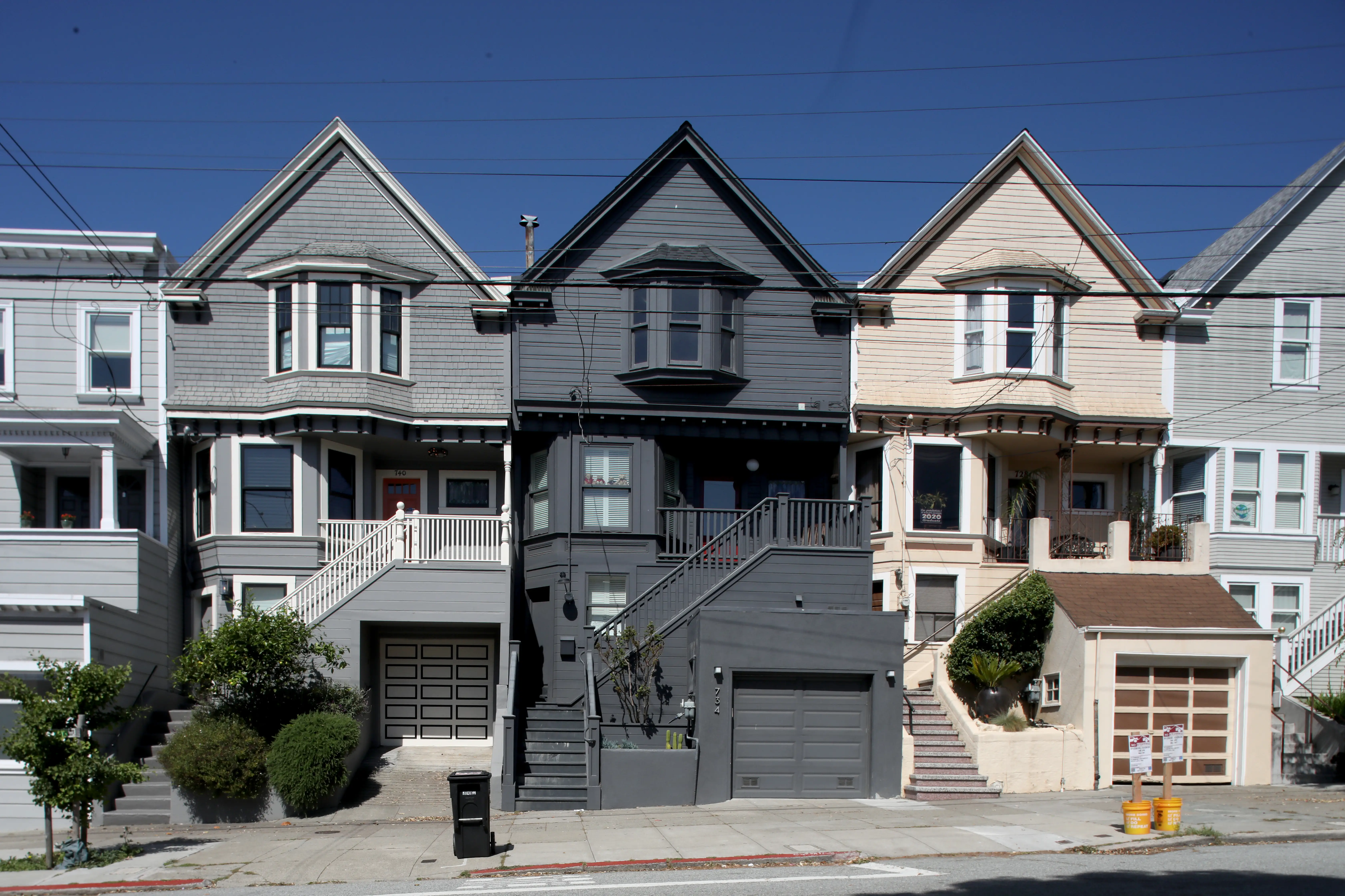 A row of multicolored, attached homes in San Francisco's Noe Valley neighborhood.
