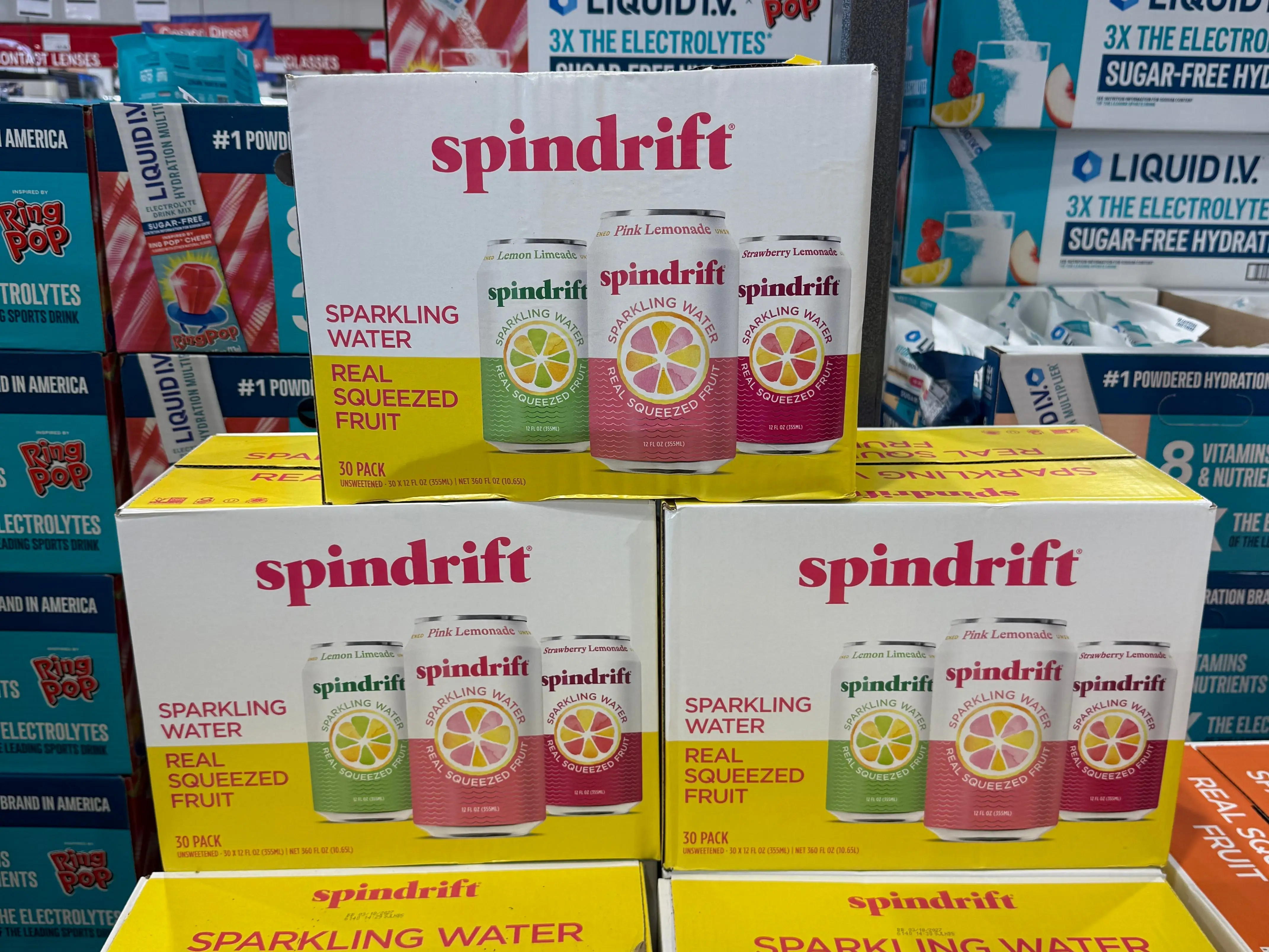 Several boxes of Spindrift sparkling water.