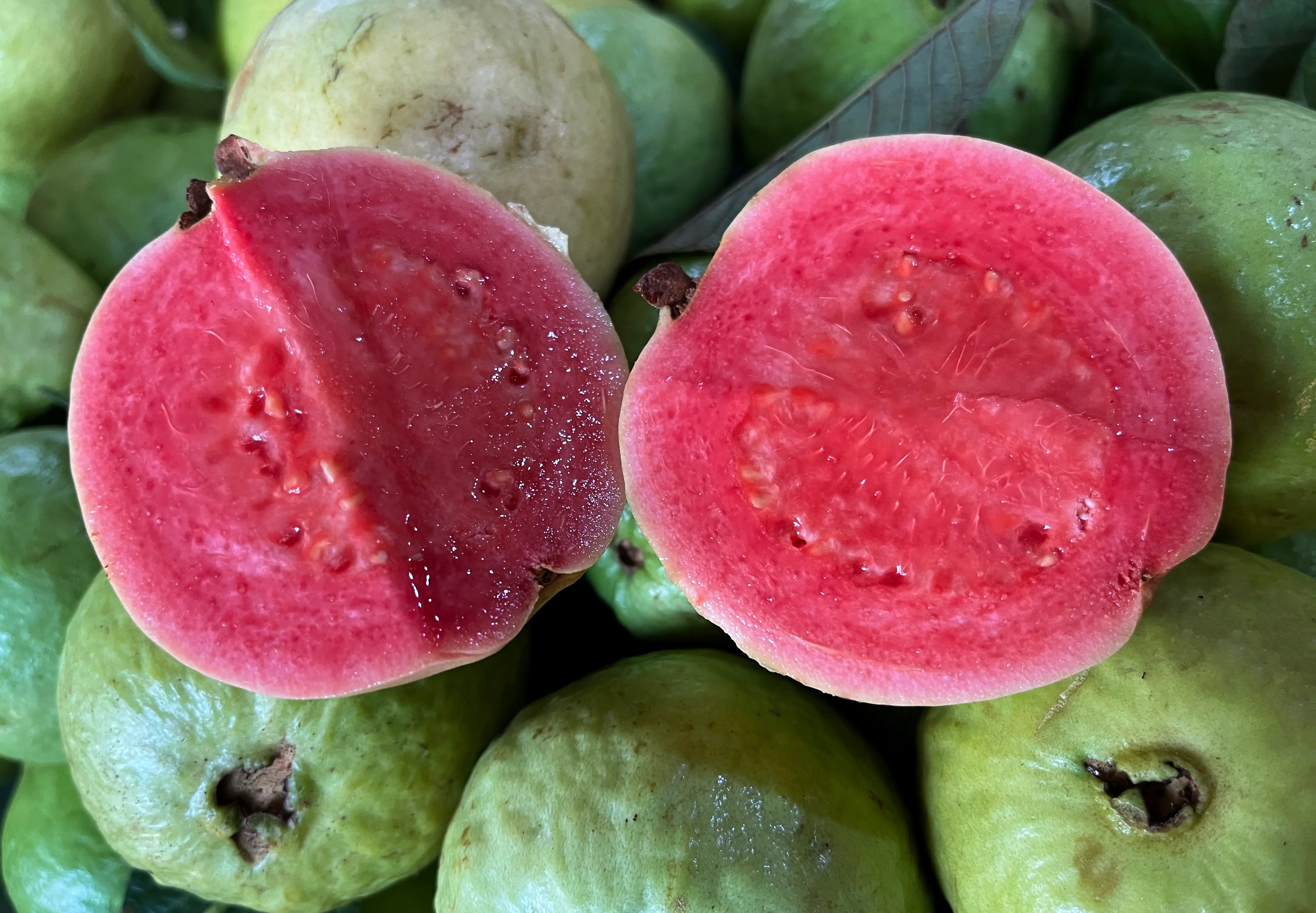 A guava broken in half.