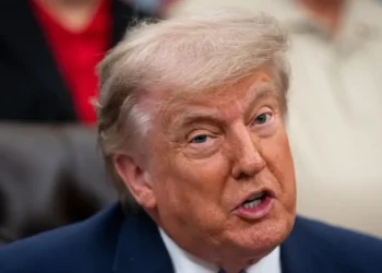Trump privately signs scaled-back AI executive order that cuts down a voluntary review period