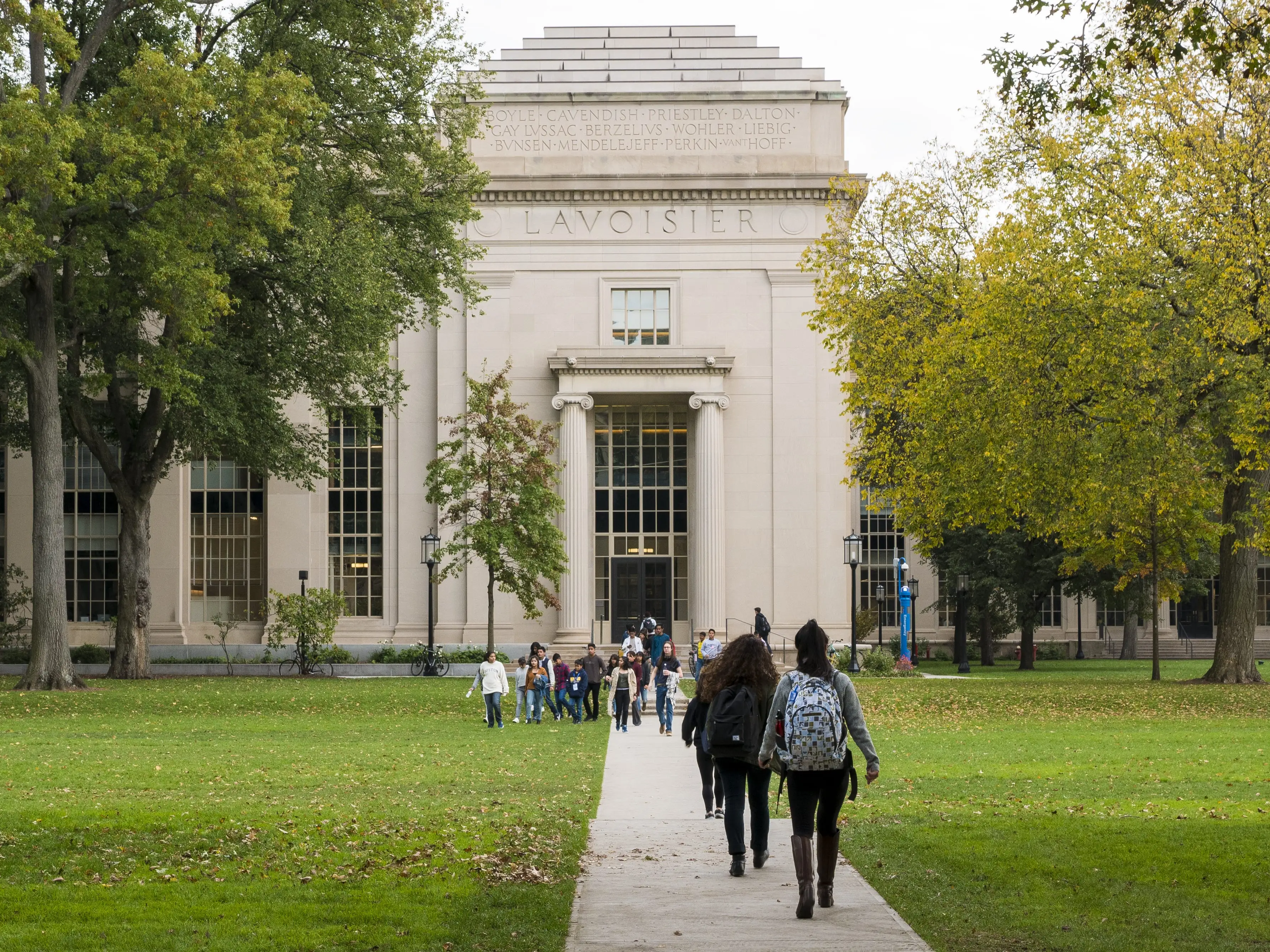 CAMBRIDGE, USA - The architecture of the Massachusetts Institute of Technology in Cambridge, Massachusetts, USA with some students passing by on November 1, 2017.