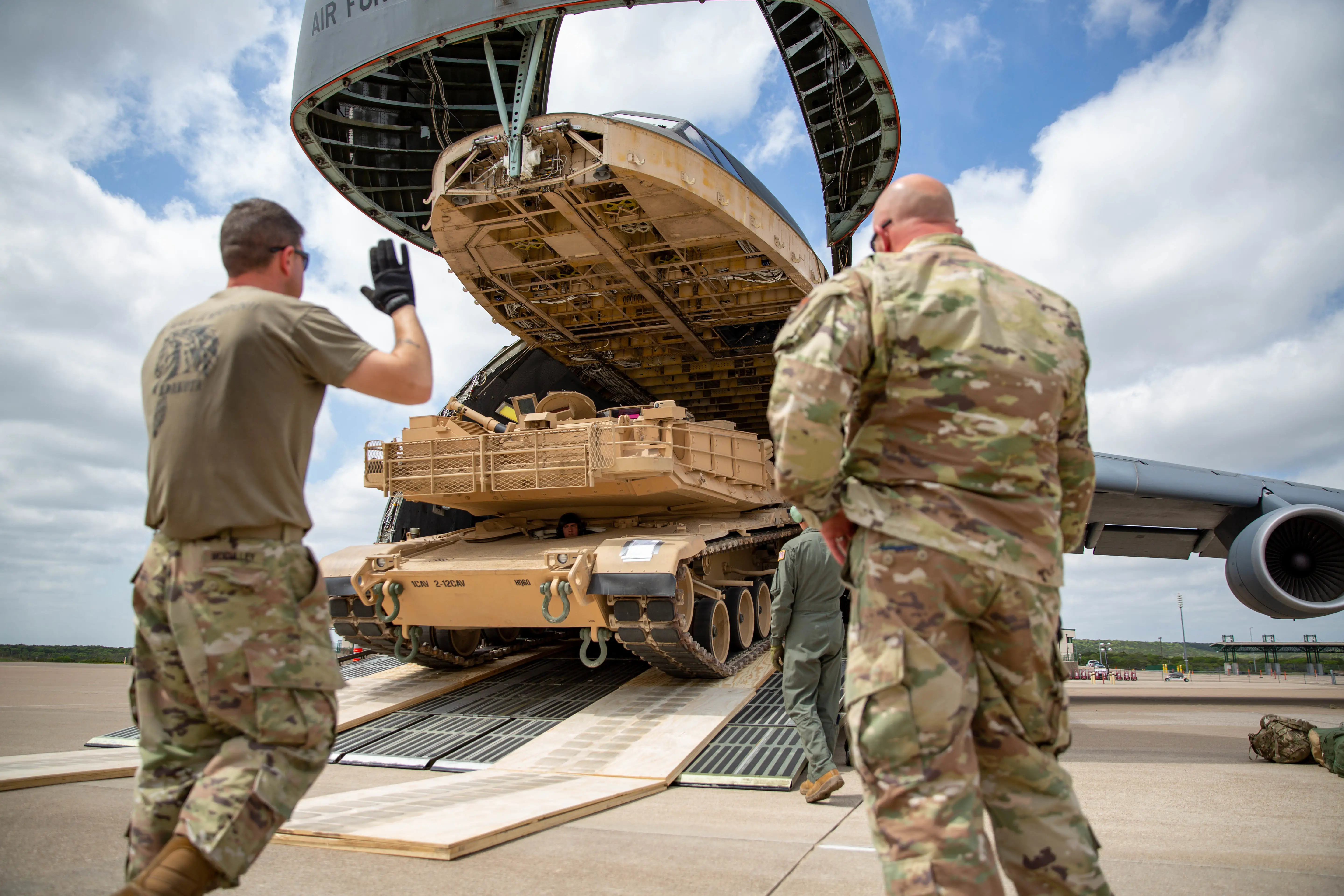 An M1 Abrams tank is loaded into a C-5M Super Galaxy.