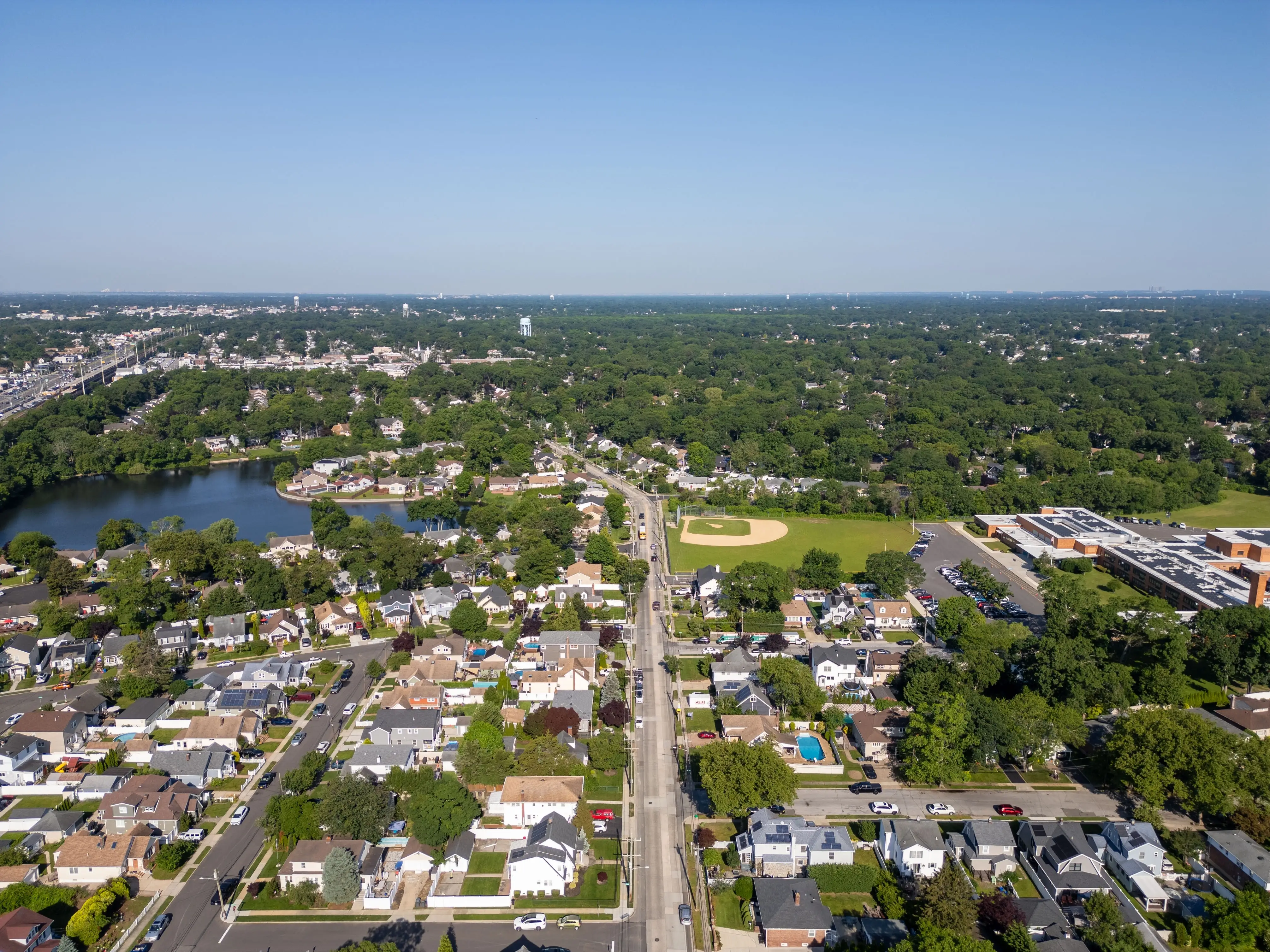 Glen Cove NY Waterfront Real Estate Sought After Beach Community Drone Photos Luxury Homes Coastal Living