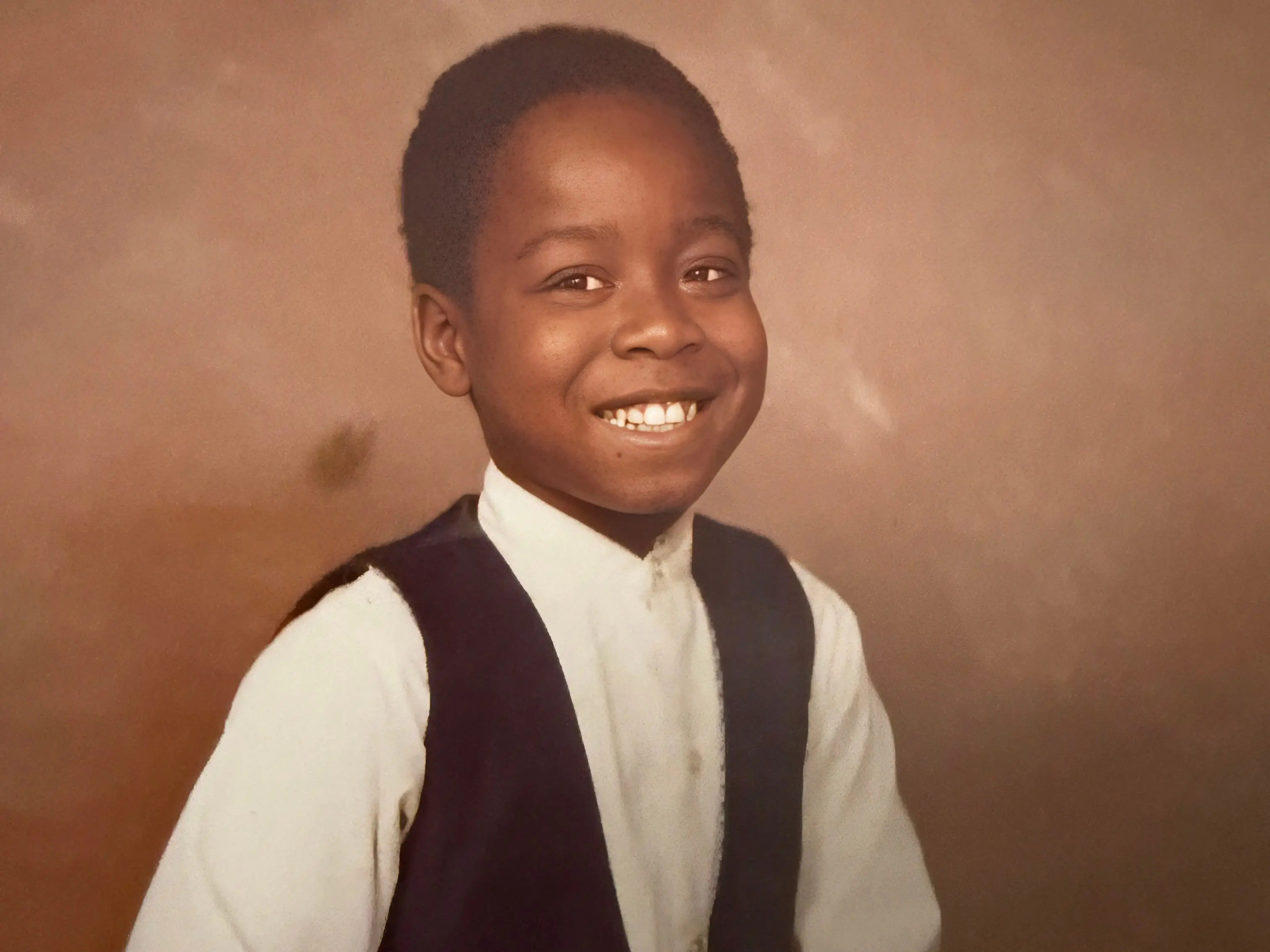The author says smiling at his dad doesn't always work.