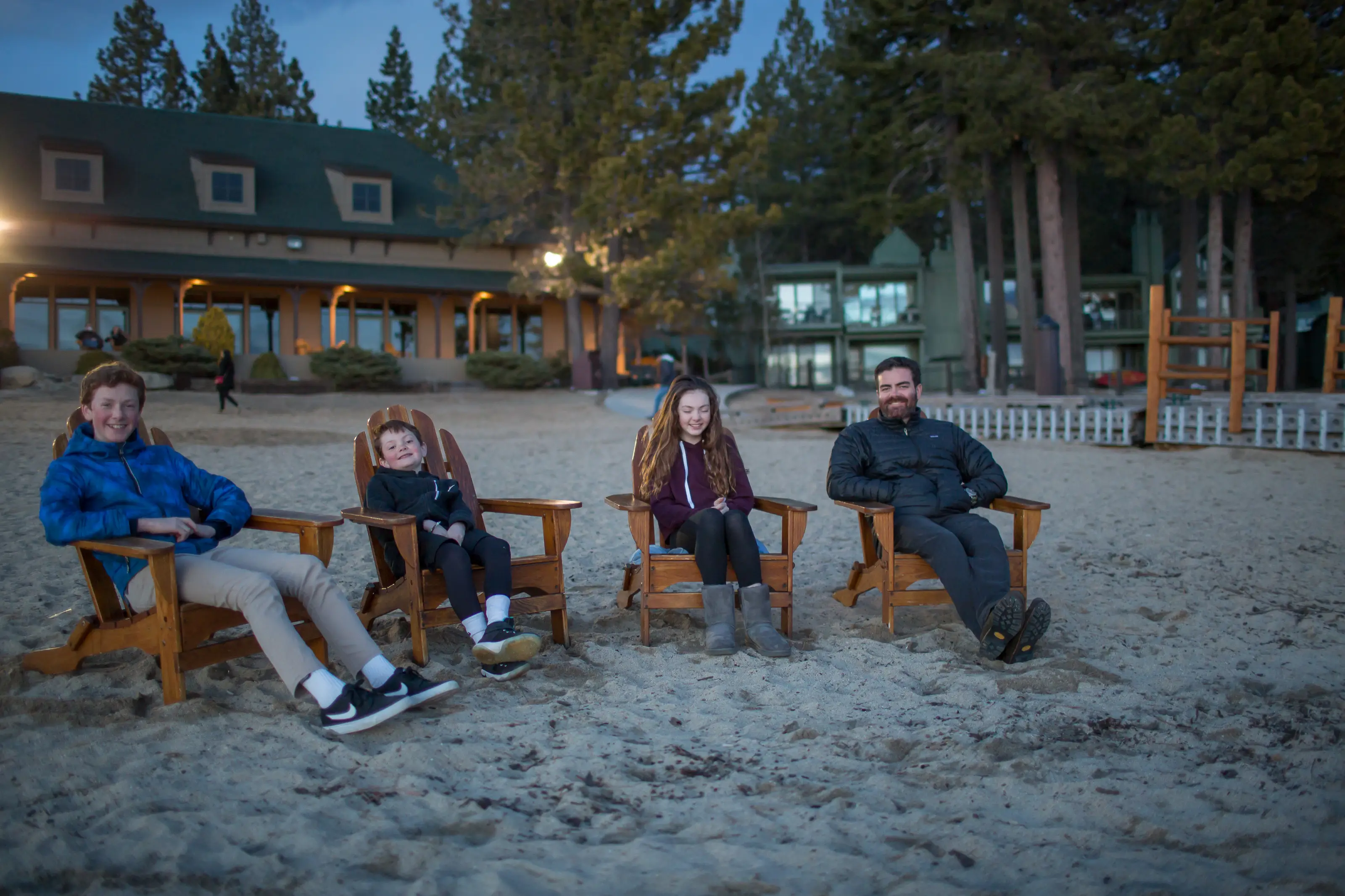 dad with kids at the beach