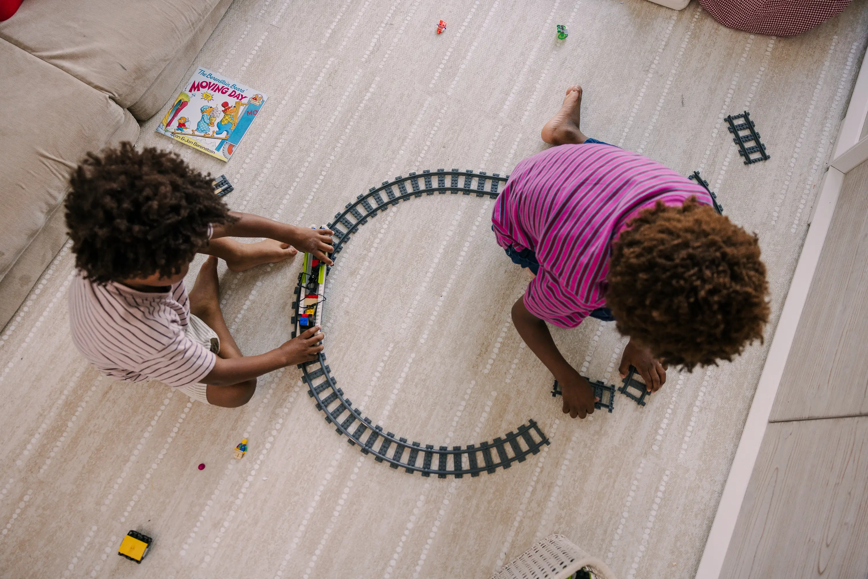 children playing with trains