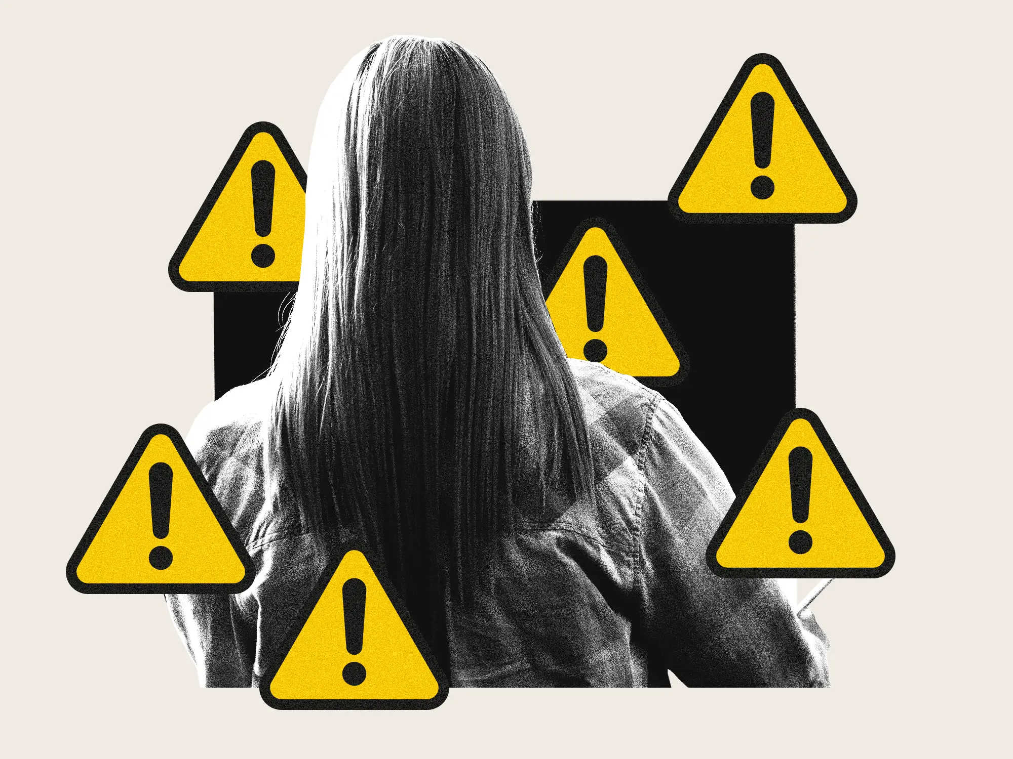 An employee in front of a computer and surrounded by alerts