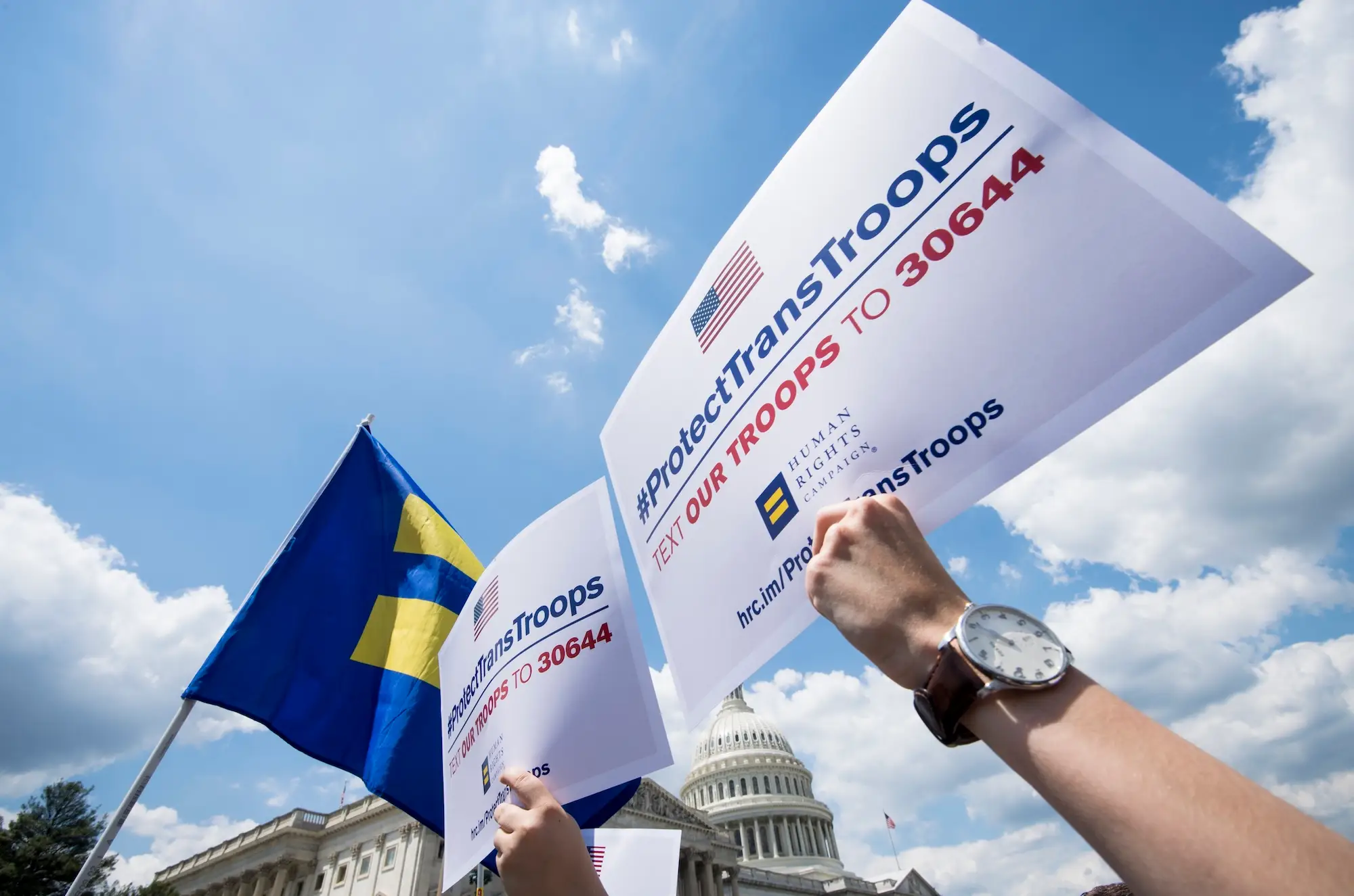 Transgender troops who sued to block their separation from the US military won a legal victory at a federal appeals court that allows them to continue serving.