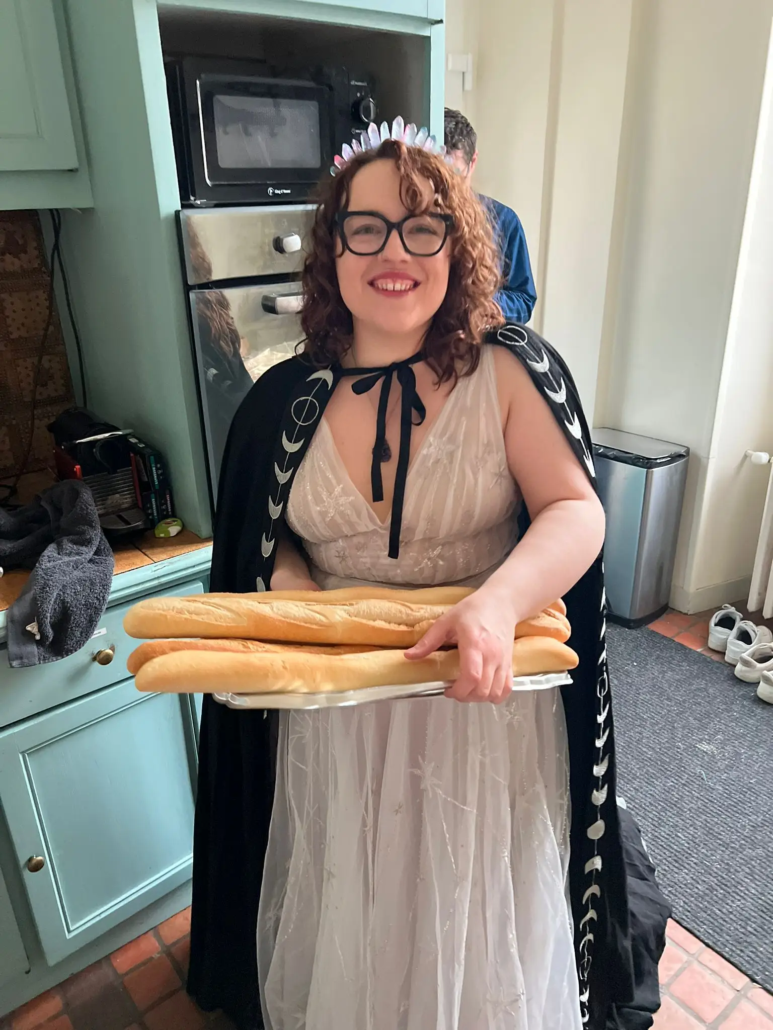 Celina Tolbert handing out baguet
