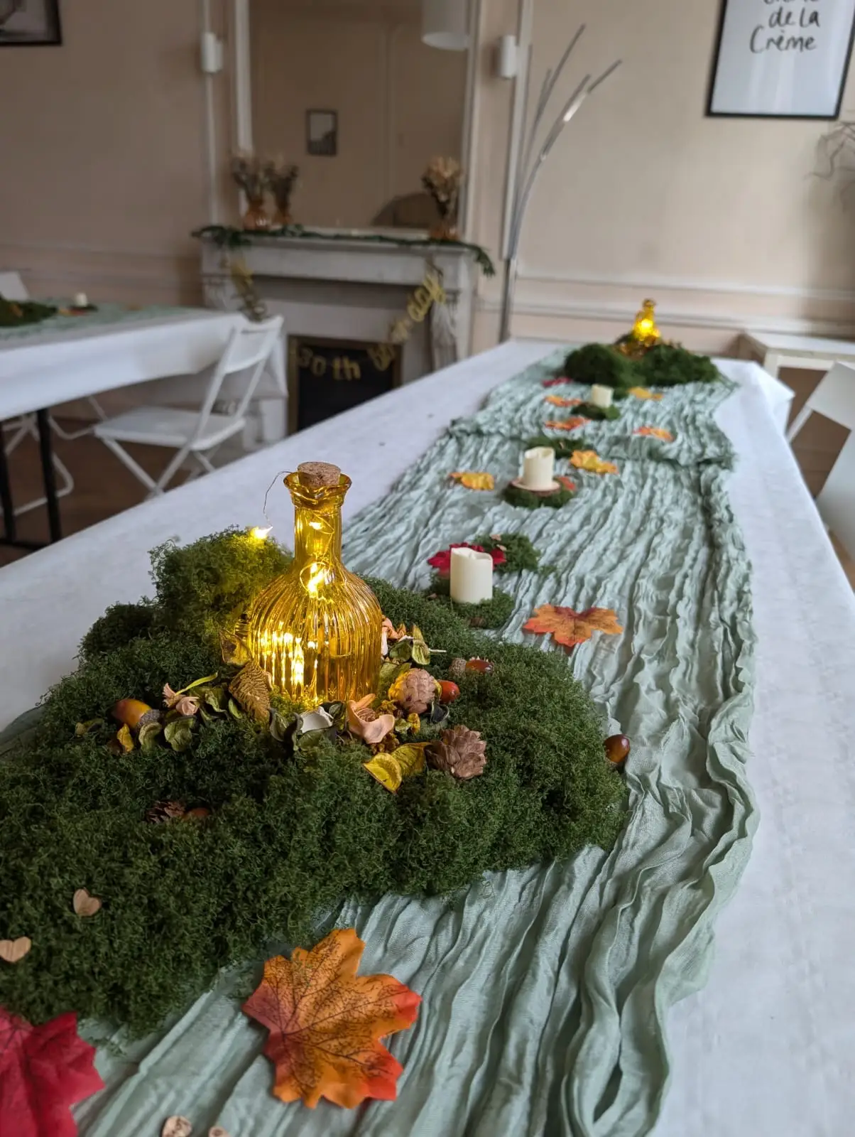 Celina Tolbert and a friend decorated the chateau with moss and leaves and candles