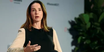 OpenAI’s CFO says she can’t say if Jony Ive’s device is an earpiece