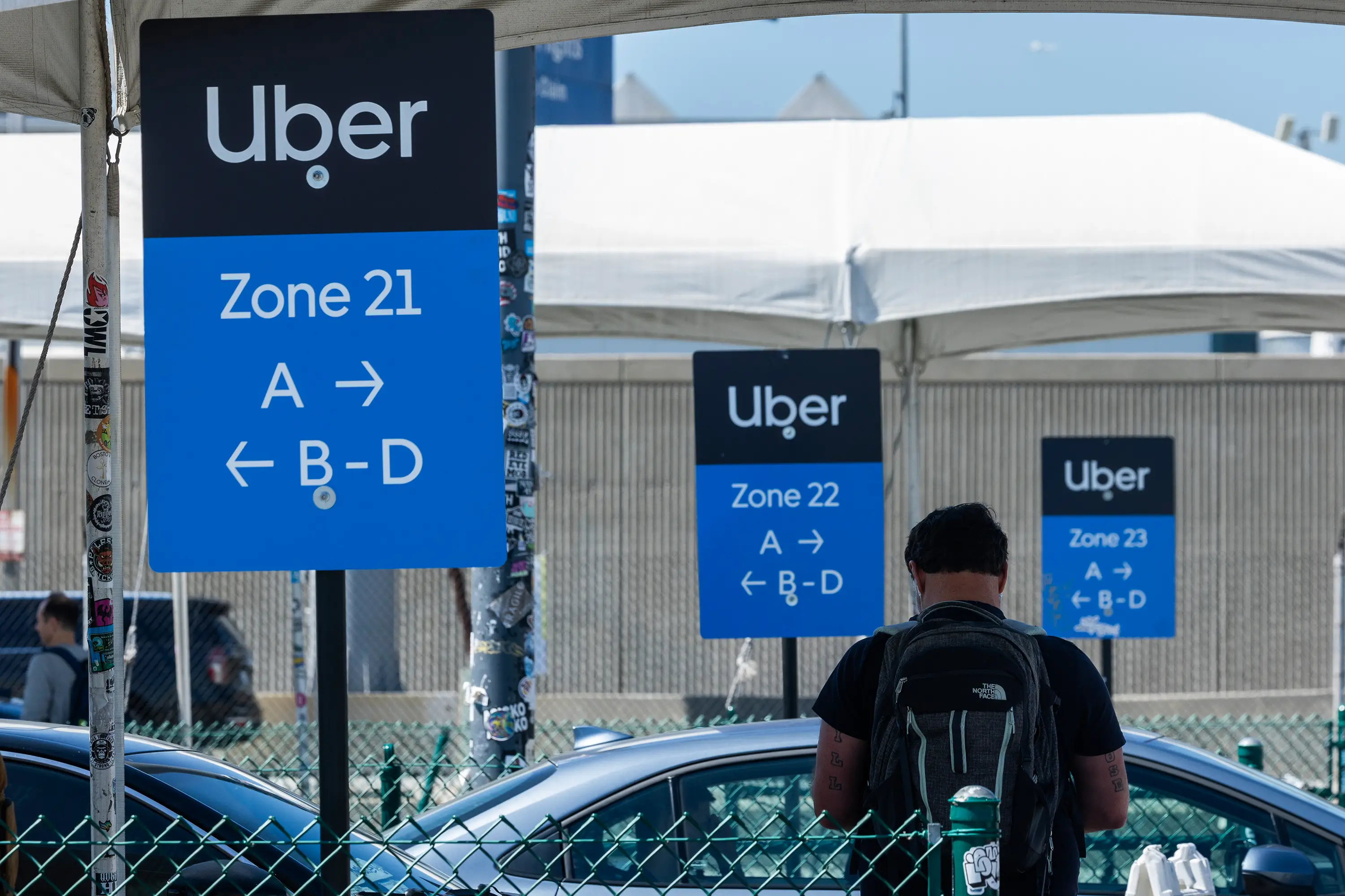 Black-and-blue signs that read 