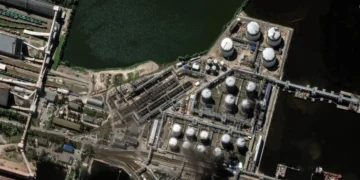 Satellite images show a blazing Russian oil terminal from Ukraine’s strikes during the annual Russian Davos
