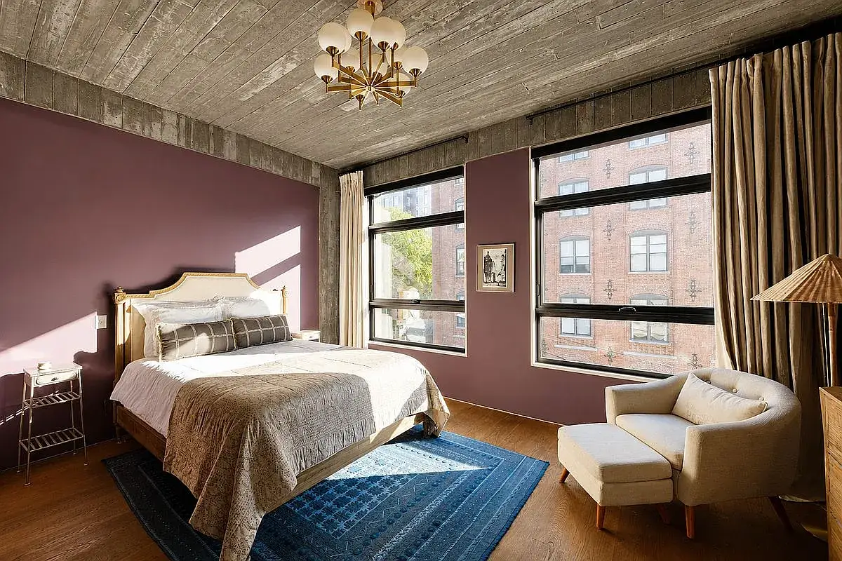 A bedroom inside 3 Wythe LN in Brooklyn, a home listed with Anthropic shares as a buying option.
