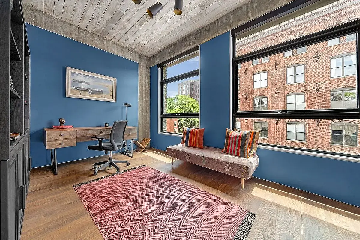 A bedroom of 3 Wythe LN in Brooklyn, a home listed with Anthropic shares as a buying option.