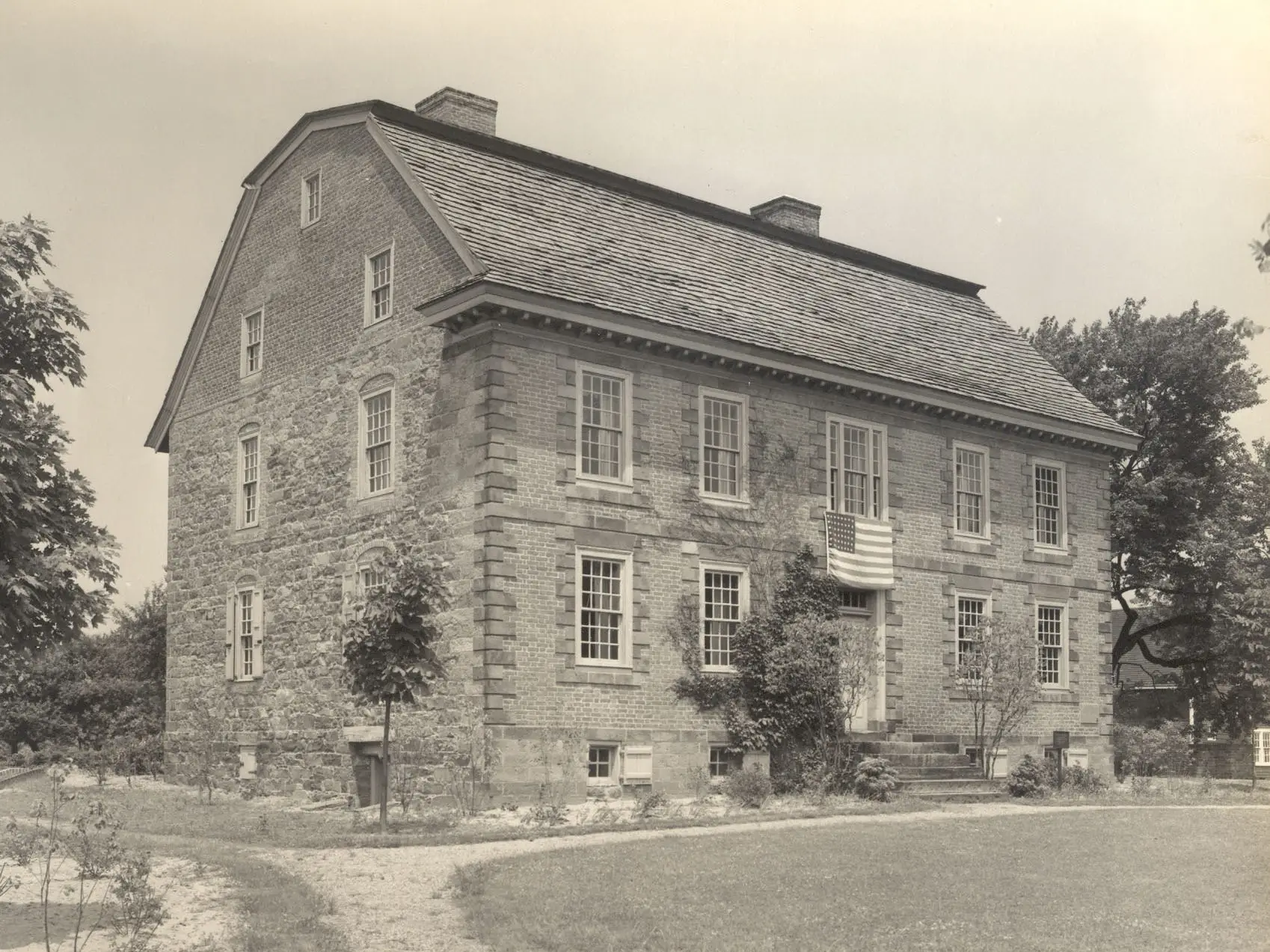 Historical photo of the exterior of the Dey Mansion