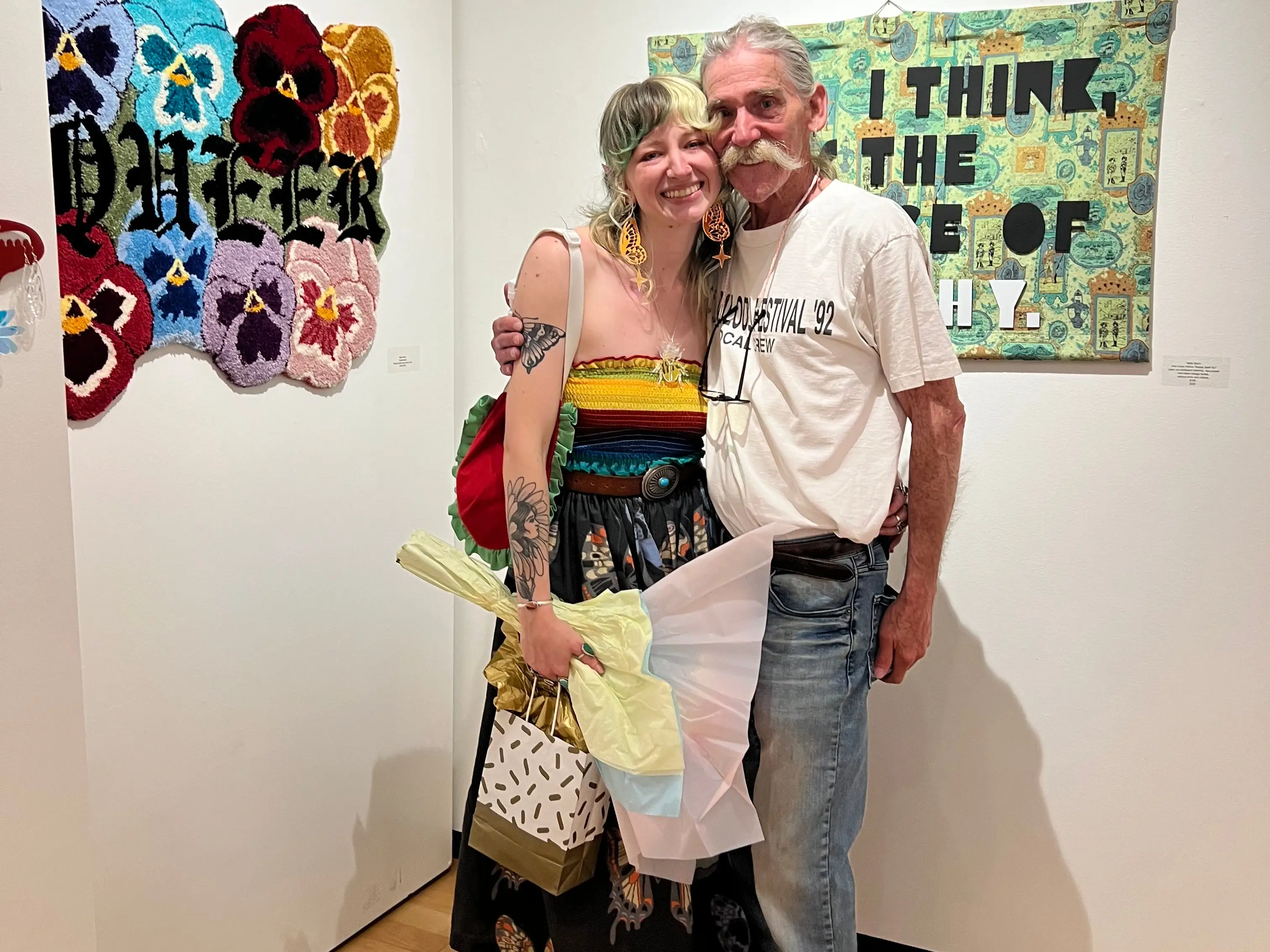Daughter and dad posing for photo