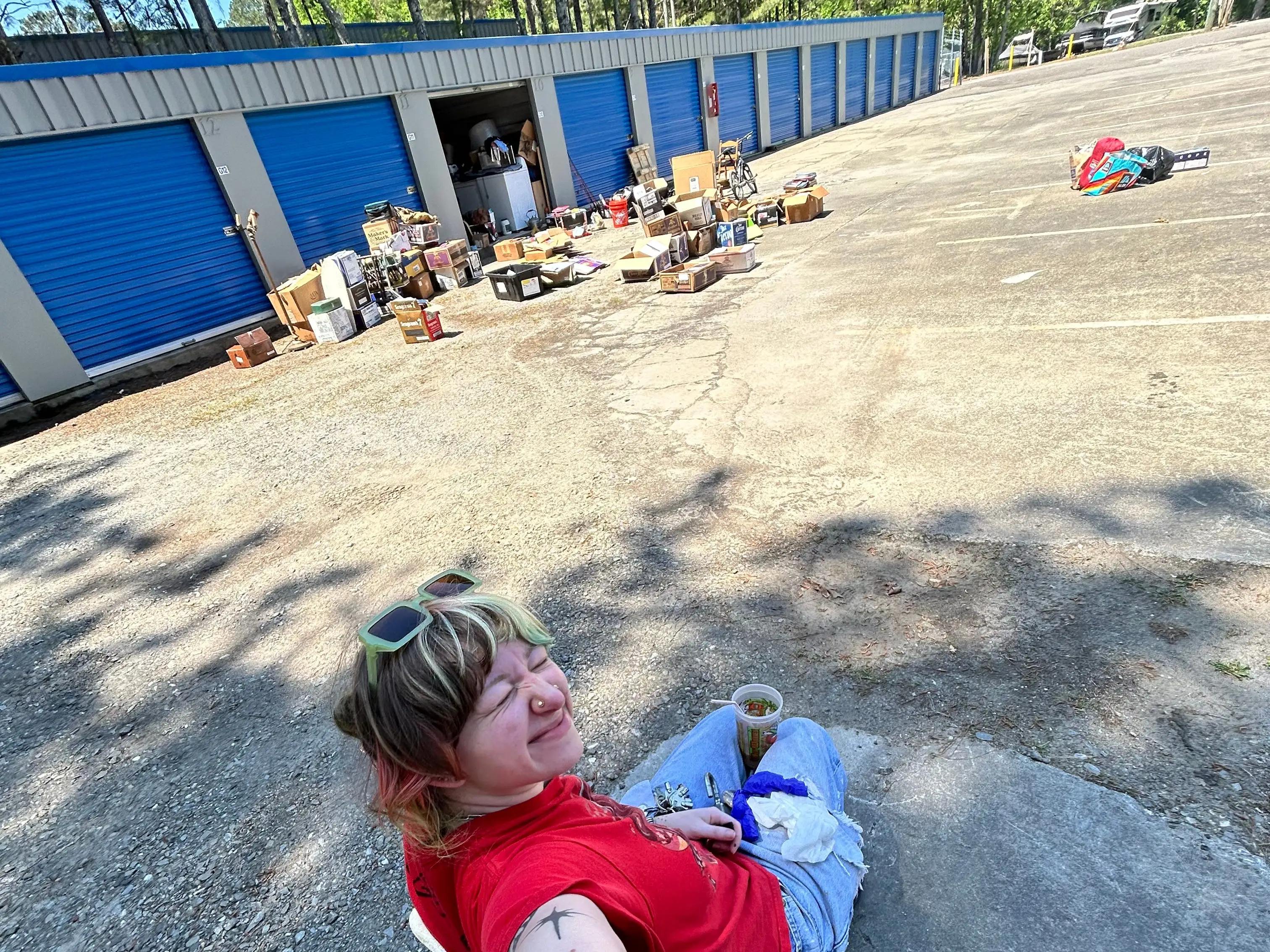 Woman emptying storage unit.