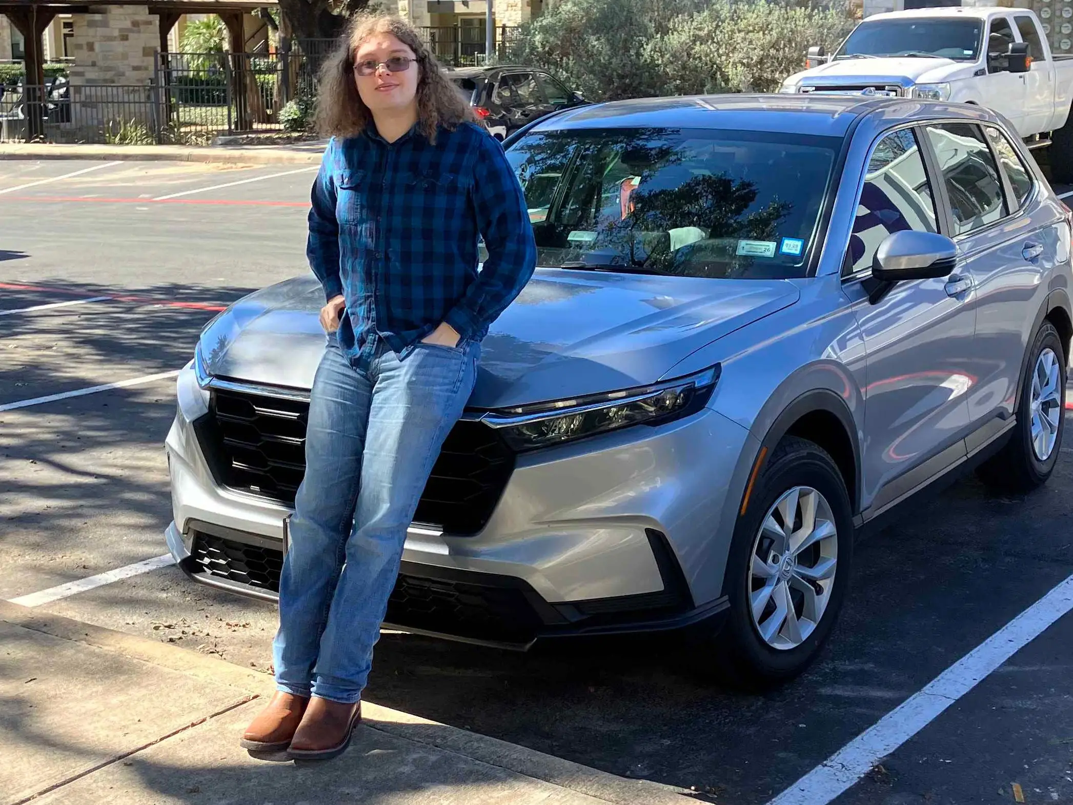 Brant Eckert leaning against a car in Texas