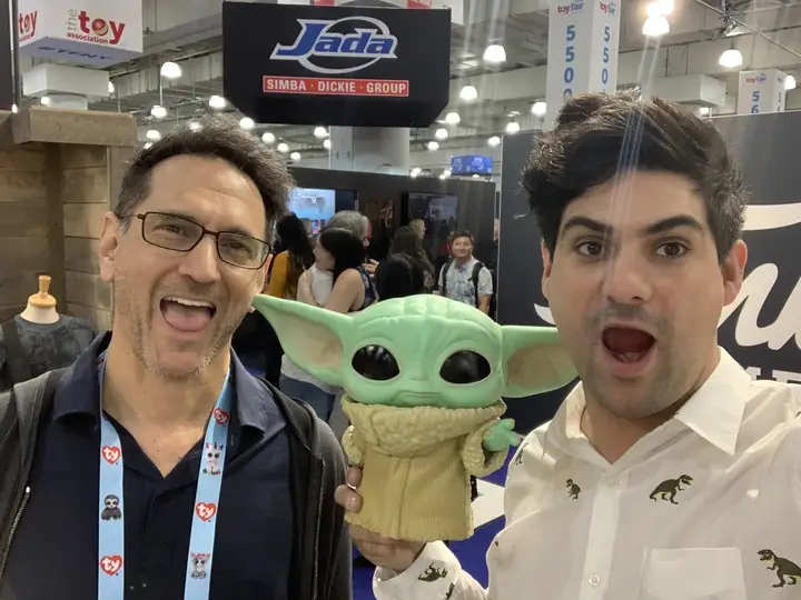 Alex Kessler holding baby Yoda