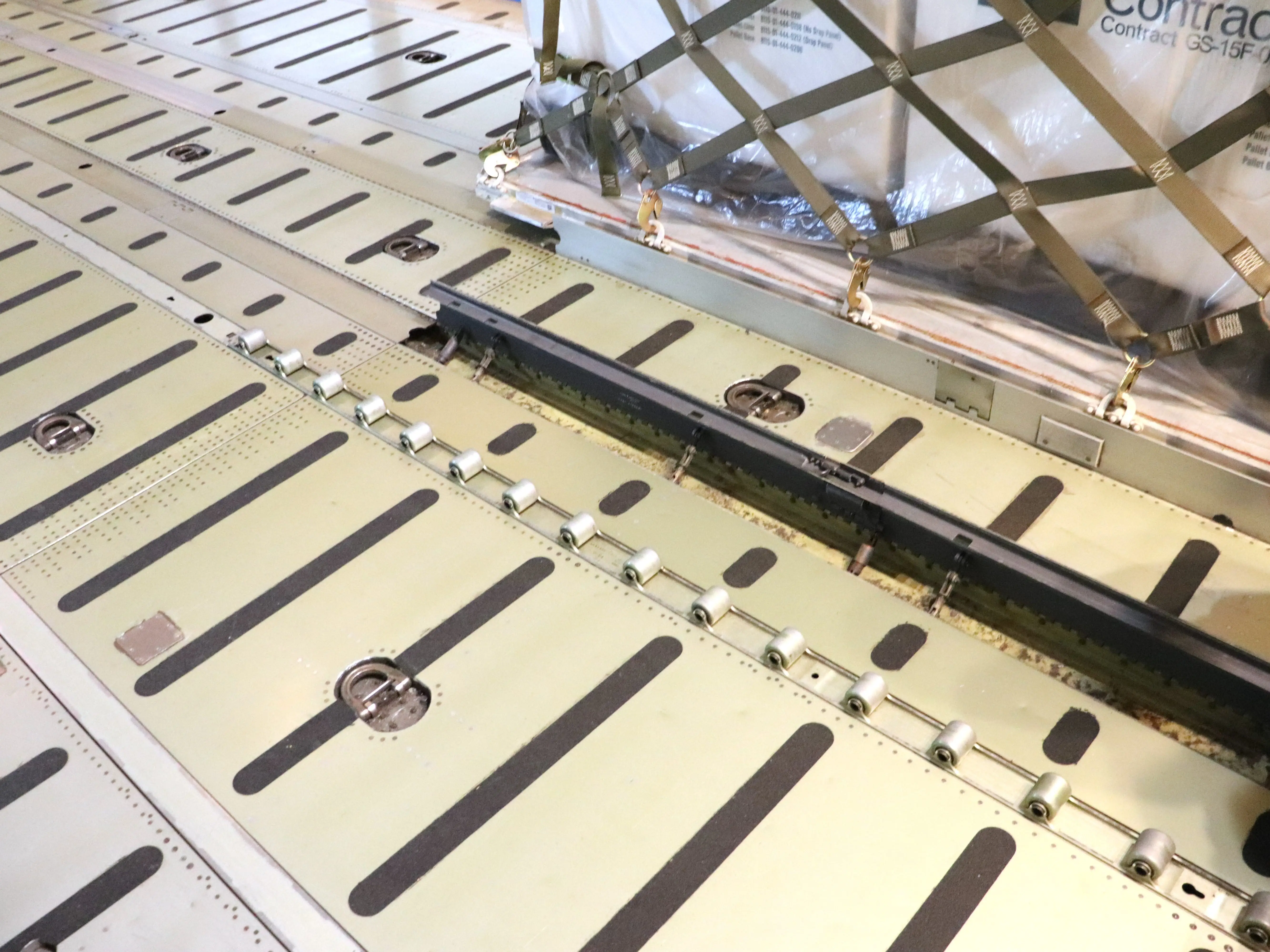 Rollers and guardrails in the floor of the C-5A Galaxy.