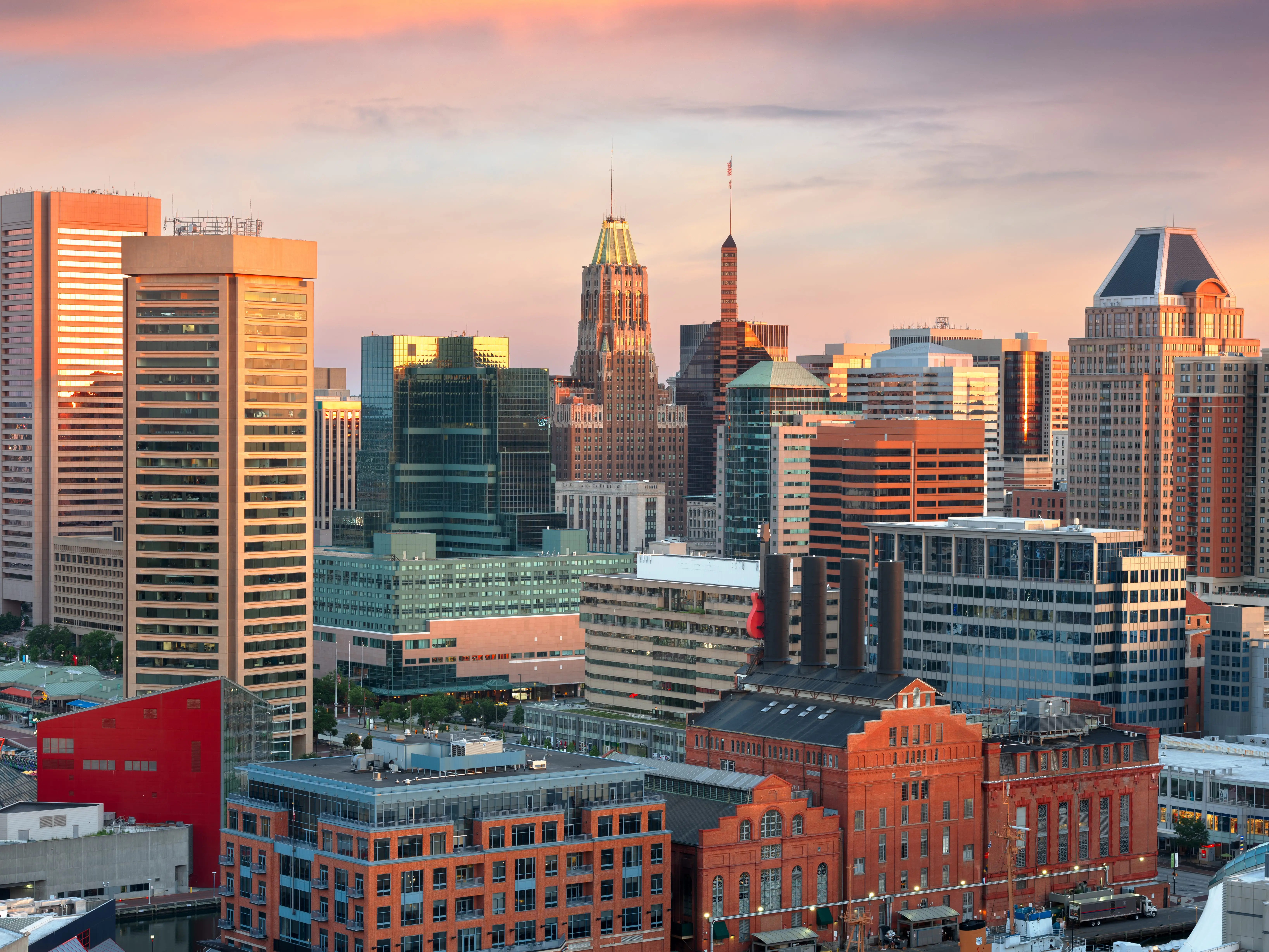 Baltimore, Maryland, USA Skyline over the Inner Harbor at dusk.