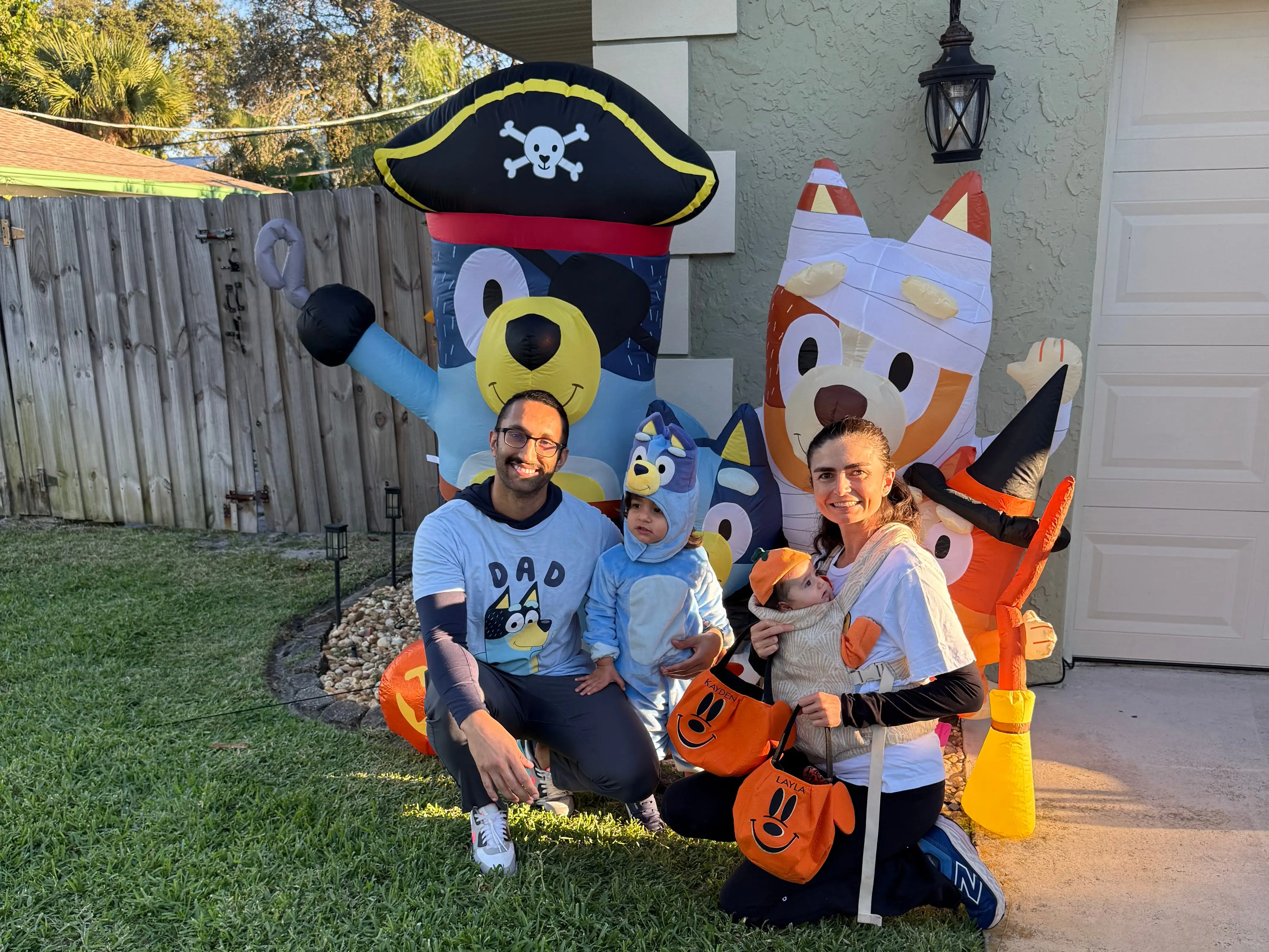 The writer and her husband and kids dressed up for Halloween in Florida.