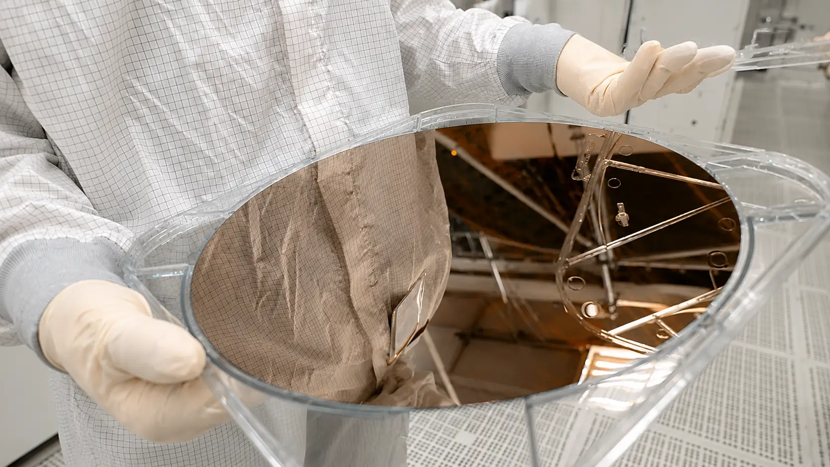Intel's Chris Auth holds a completed wafer.
