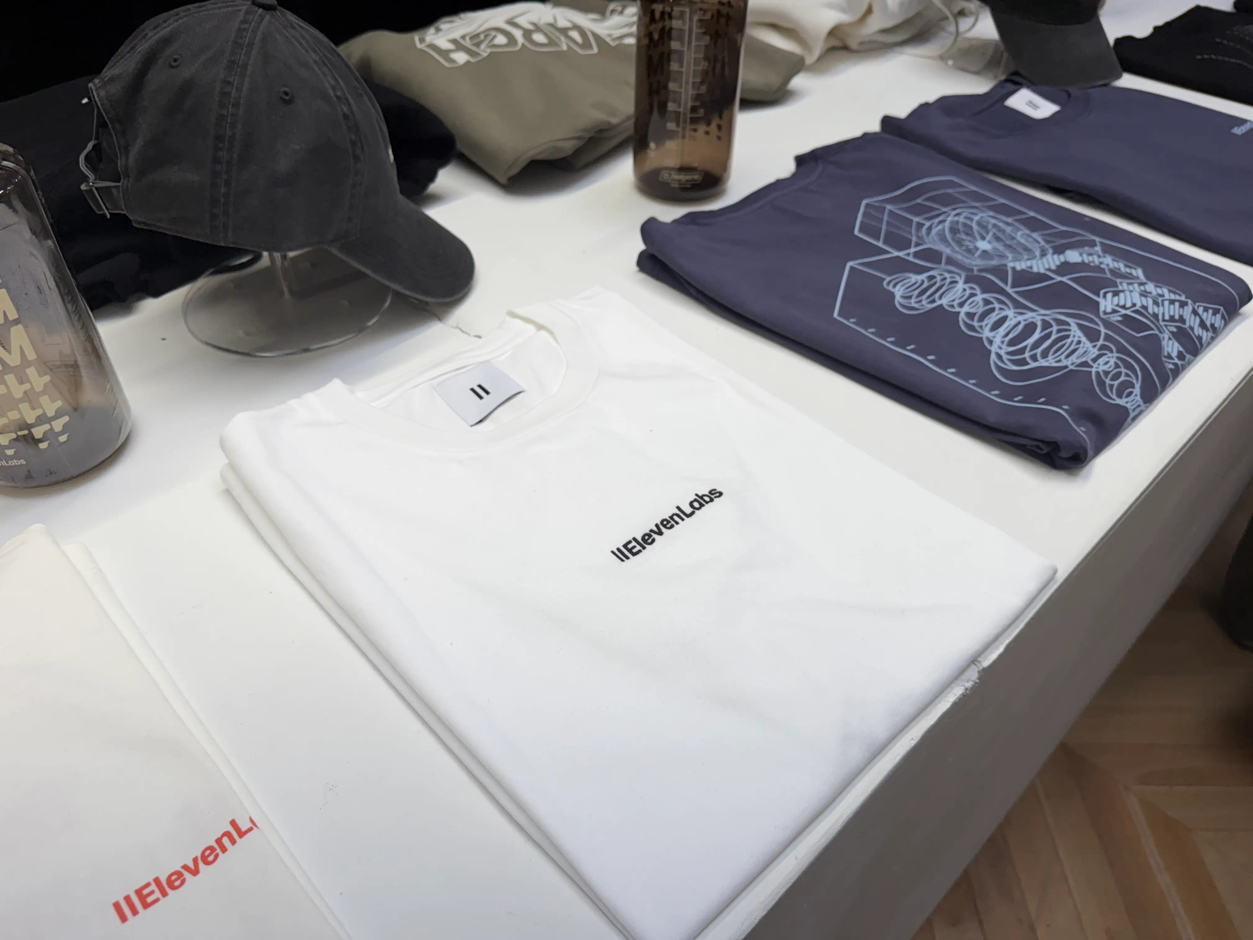 ElevenLabs merch is pictured.