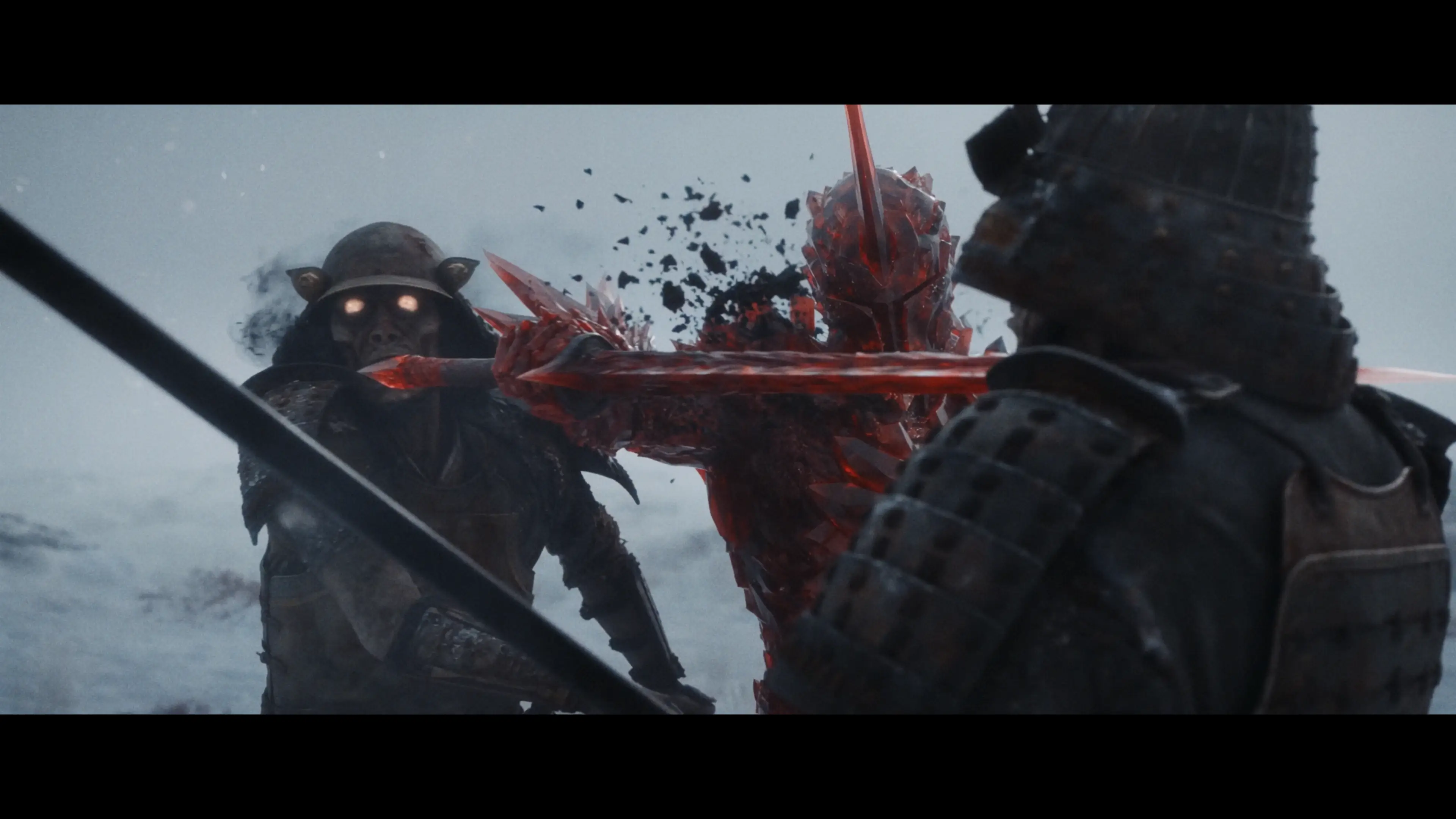 An action scene featuring a red-armored fighter from the movie 