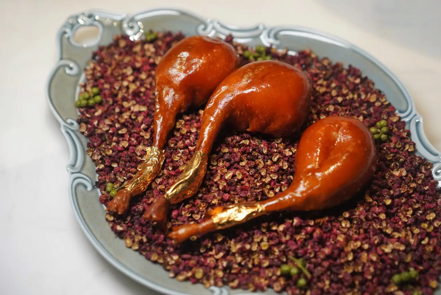 Song's crispy pigeon leg in Hangzhou, China.