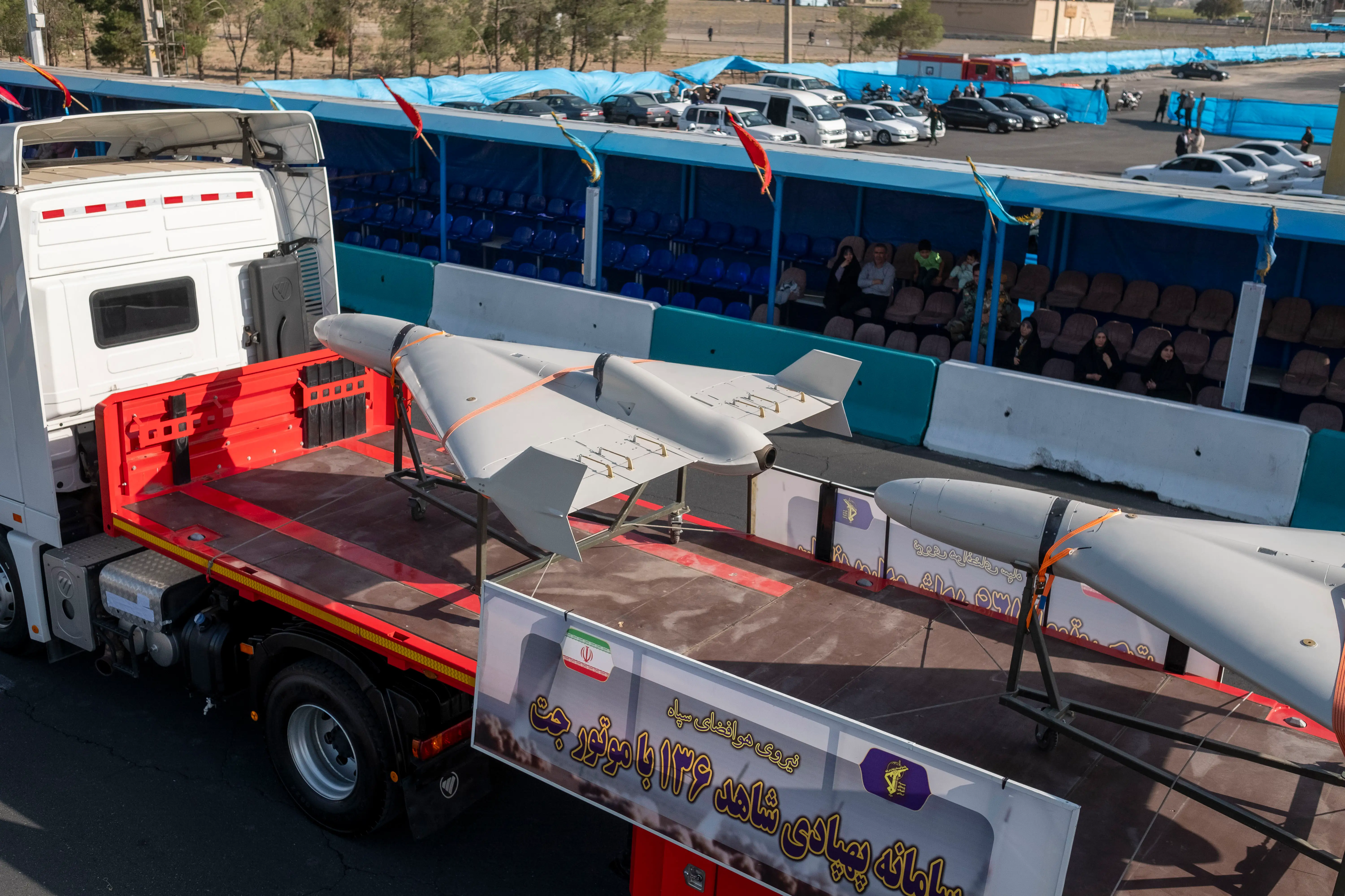 Iranian-made uncrewed aerial vehicles equipped with jet engines are carried by a truck during a military parade commemorating the anniversary of the Iran-Iraq War outside the Khomeini Shrine in the south of Tehran, Iran, on September 21, 2024.