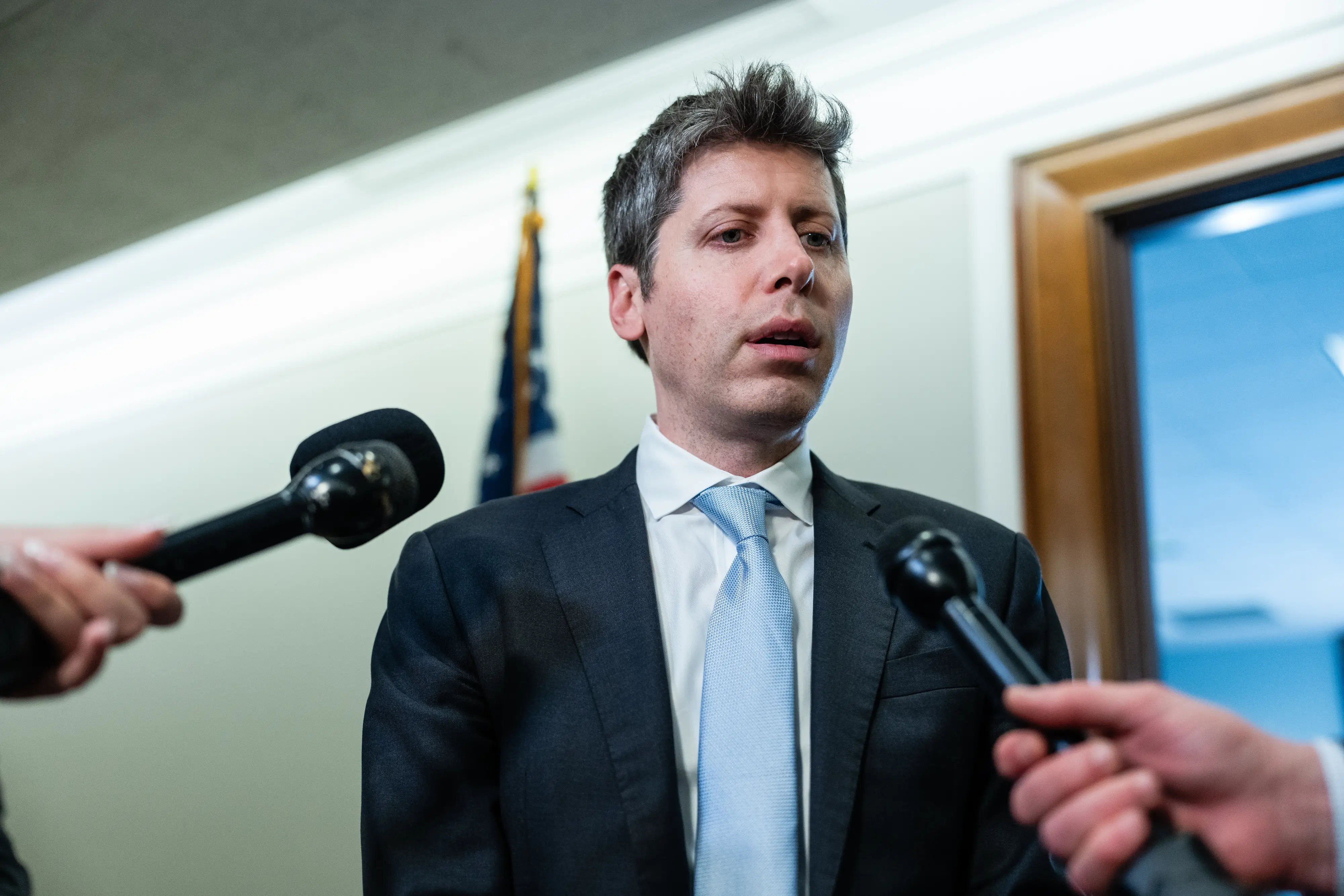 Sam Altman, chief executive officer and co-founder of OpenAI Inc., speaks with members of the media following a meeting with Senator Bernie Sanders, an Independent from Vermont, not pictured, on Capitol Hill in Washington, DC, US, on Wednesday, June 3, 2026.