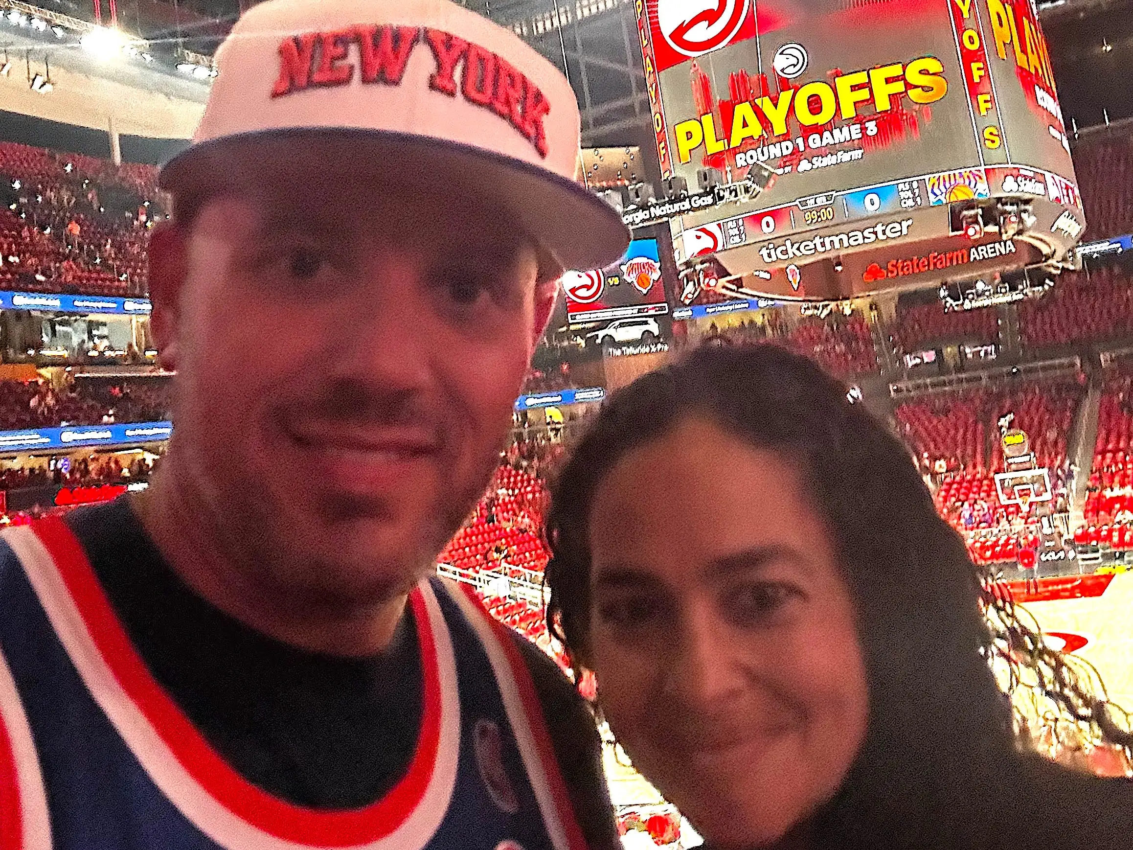 The author and her husband attending game 3 of the 2026 NBA playoffs in Atlanta.