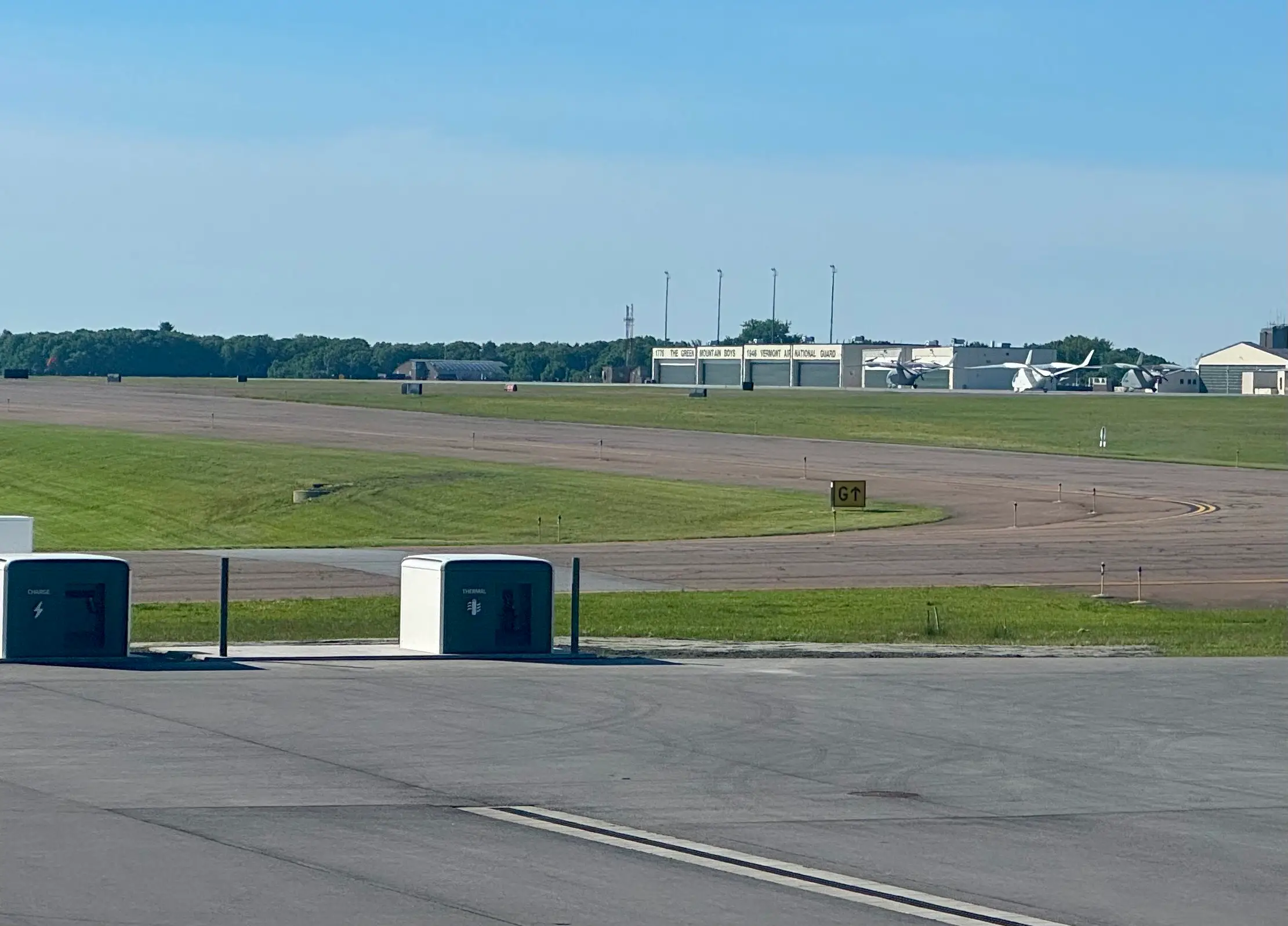 The chargine cubes with the aircraft in background.