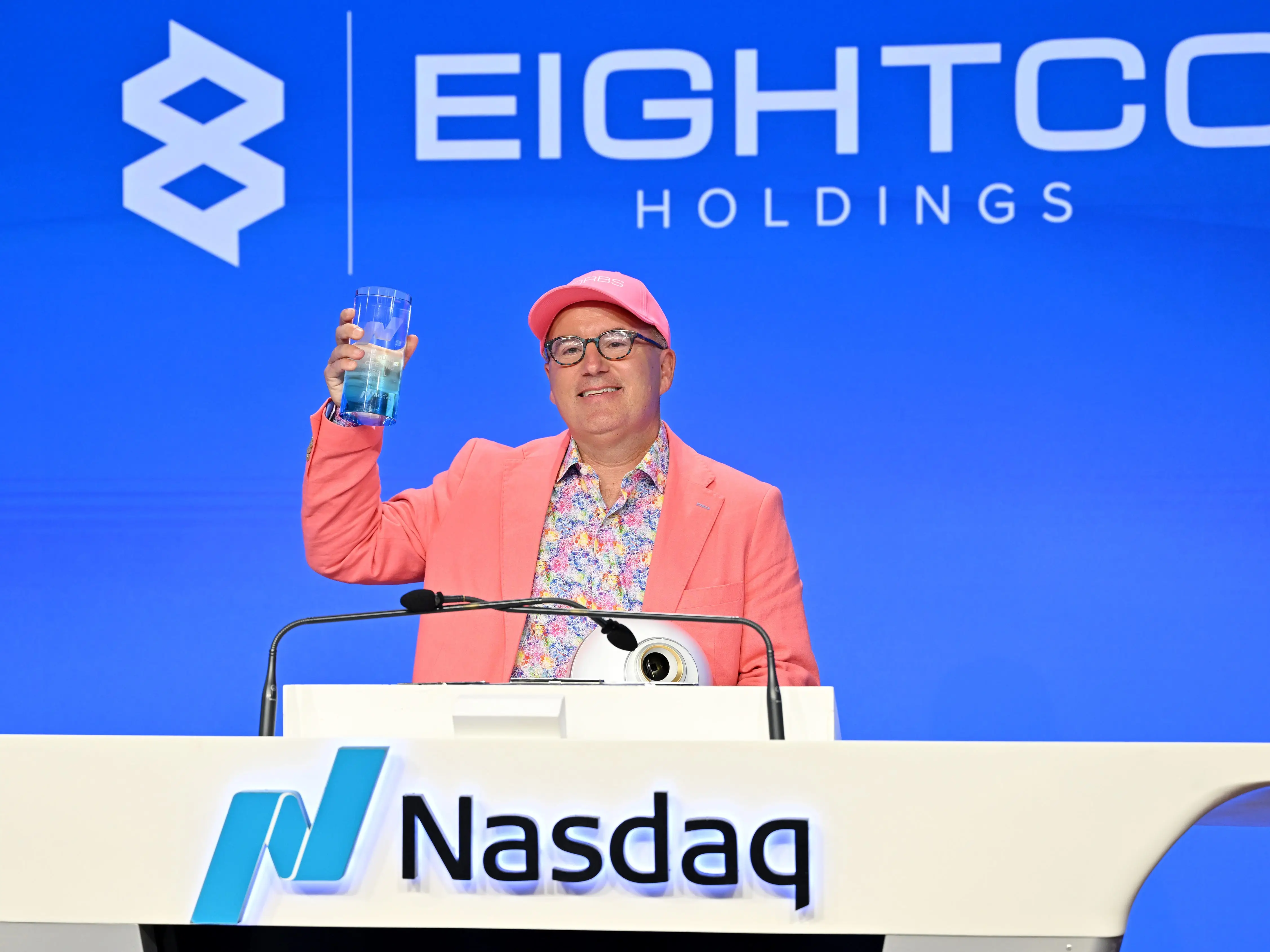Dan Ives rings the opening bells at the Nasdaq exchange.