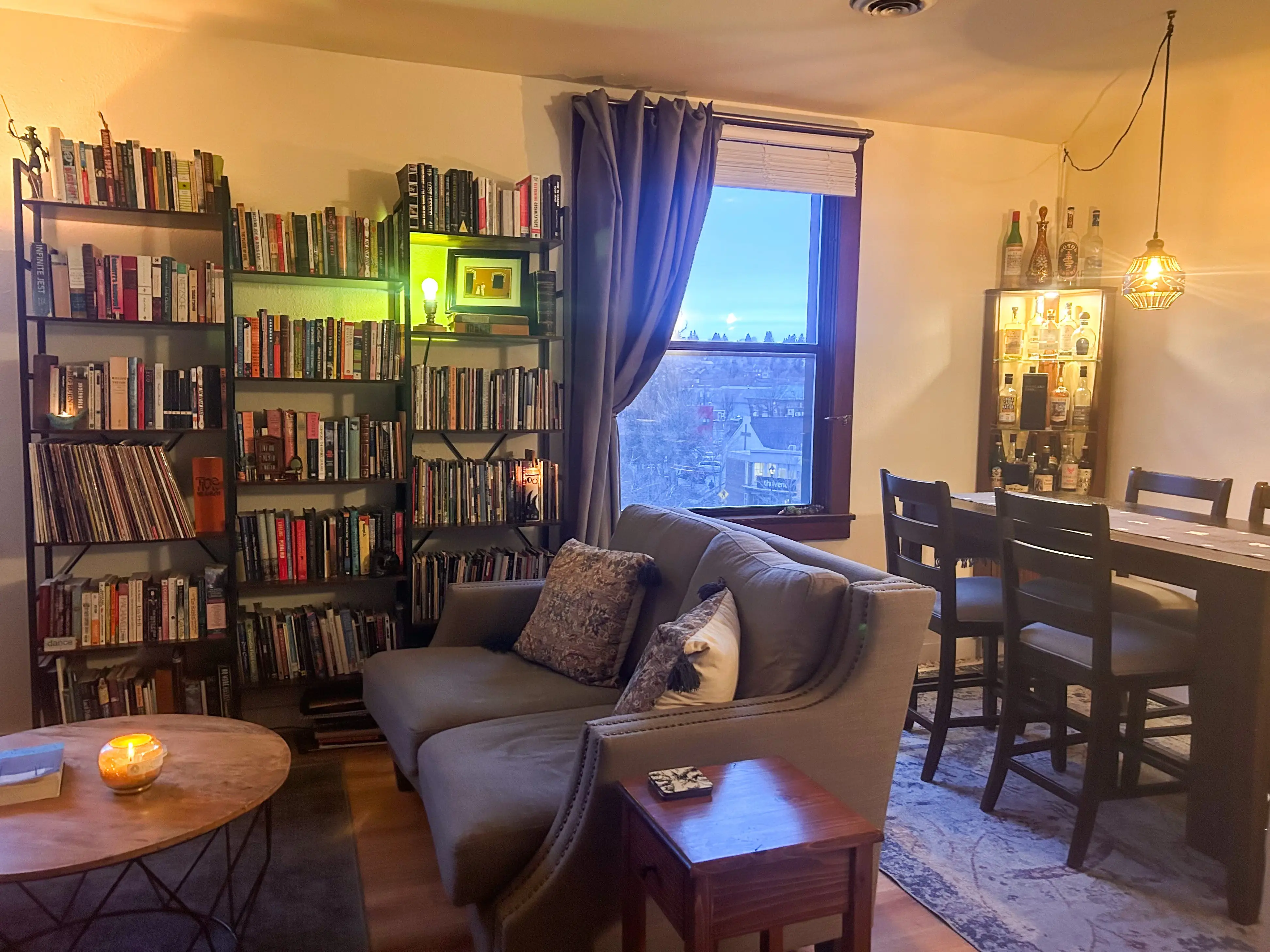 The interior of a living and dining area in an apartment.